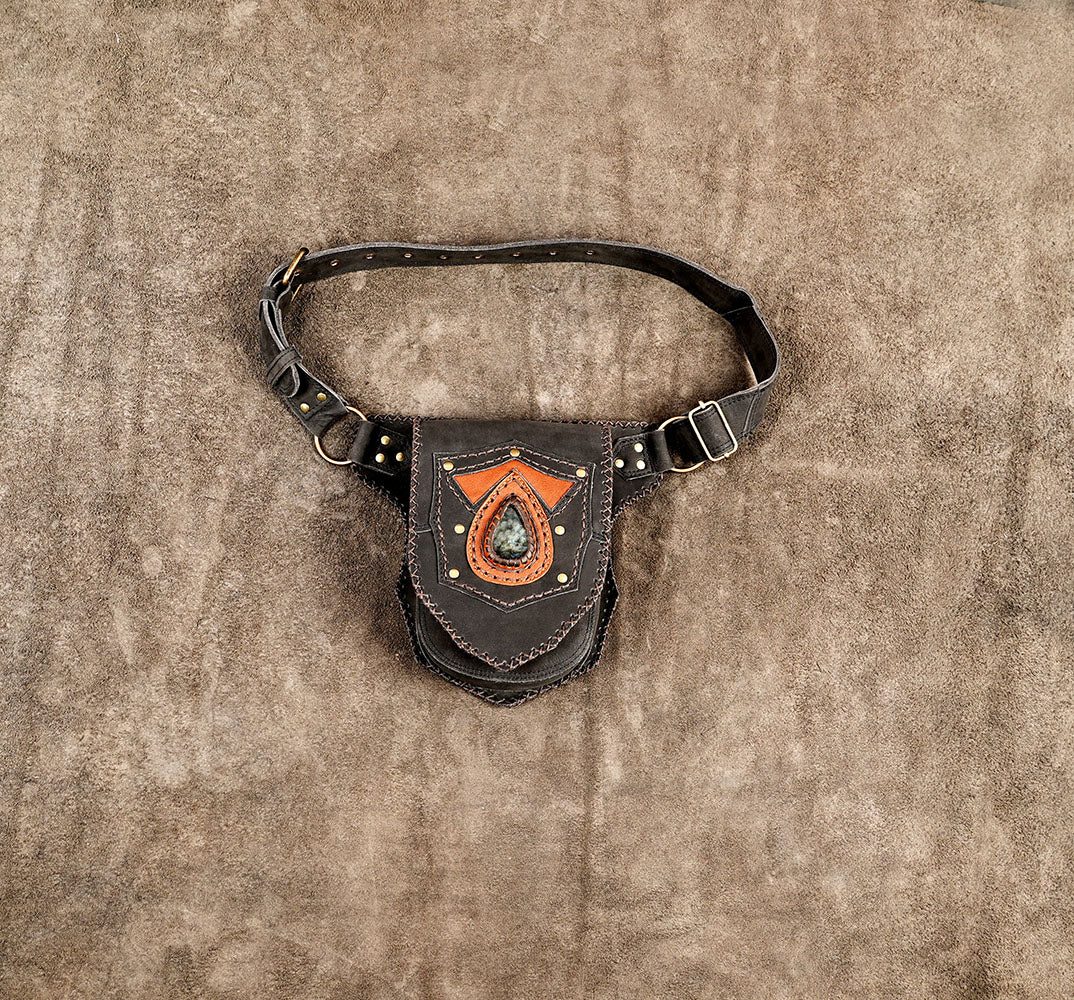 Black leather utility belt bag with brown leather accents and a teardrop stone   