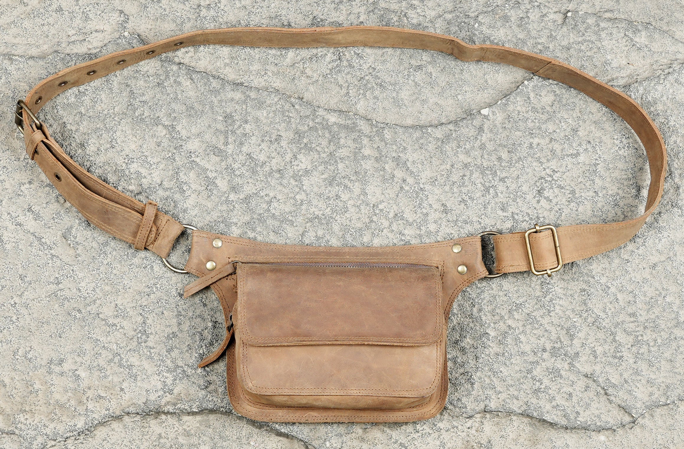 Leather waist belt with braided edges and natural stone