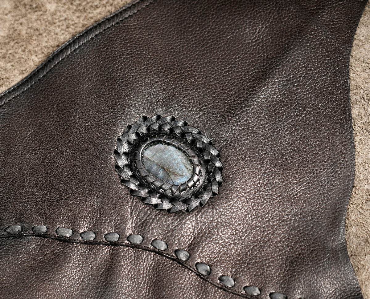 Steampunk leather skirt with braided edges and decorative hardware