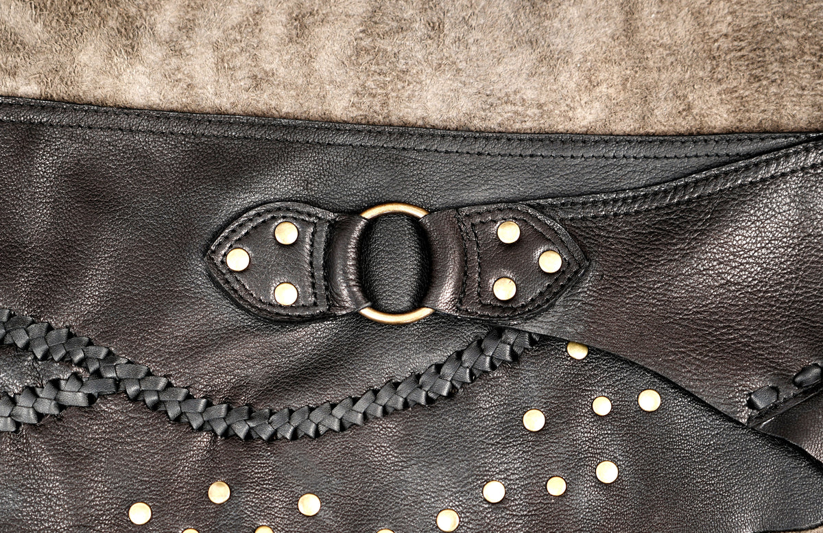 Gothic leather festival skirt with metal studs and textured finish