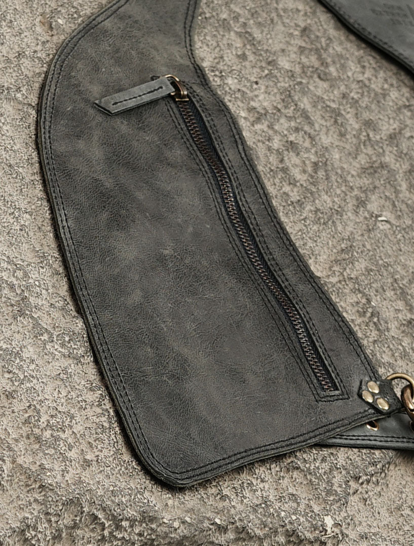 Black leather chest holster harness with adjustable waist strap
