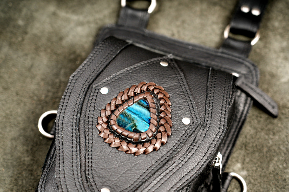 Black leather leg pouches with detachable thigh straps and silver swivel clasps