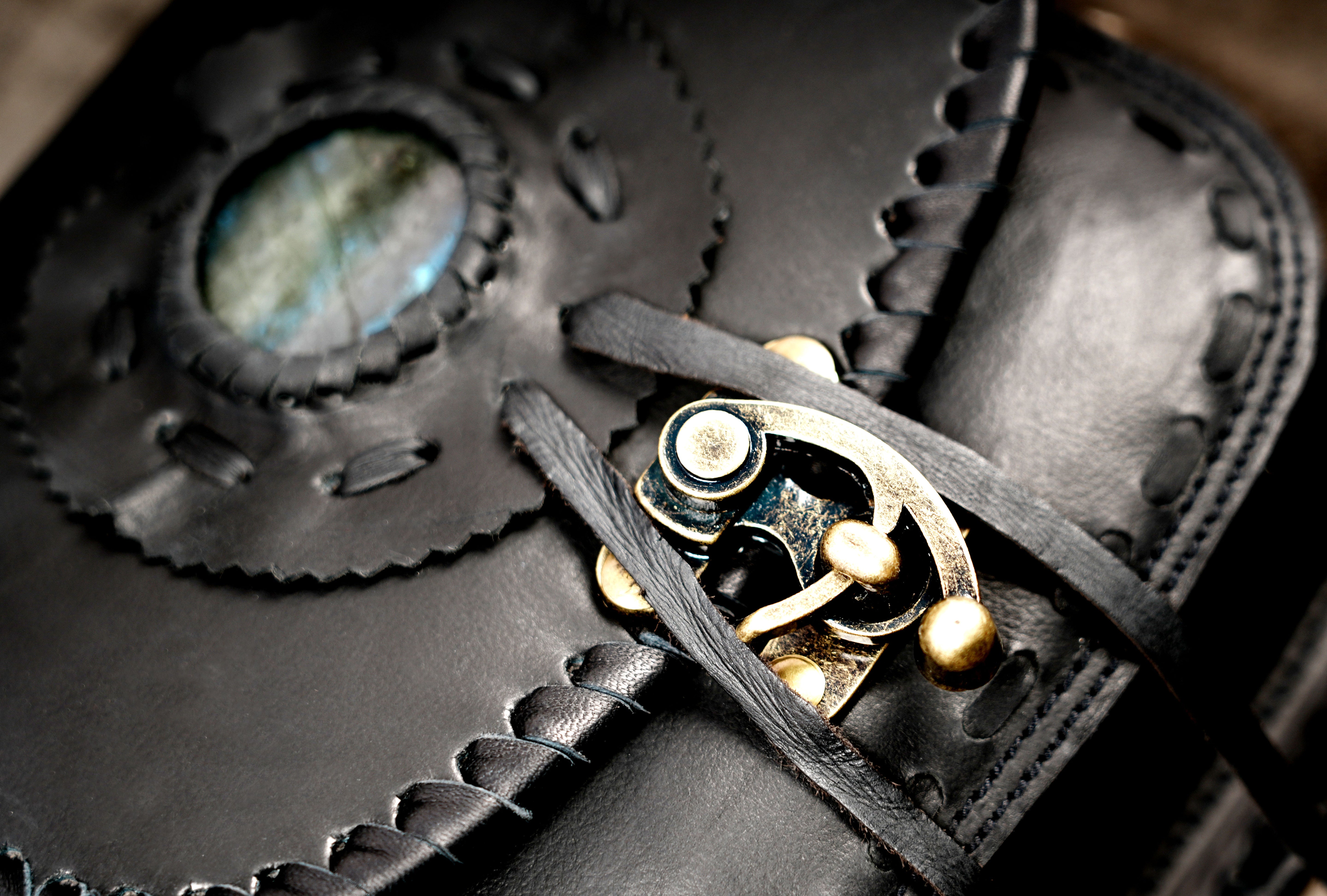 Black leather hip pouch with adjustable strap