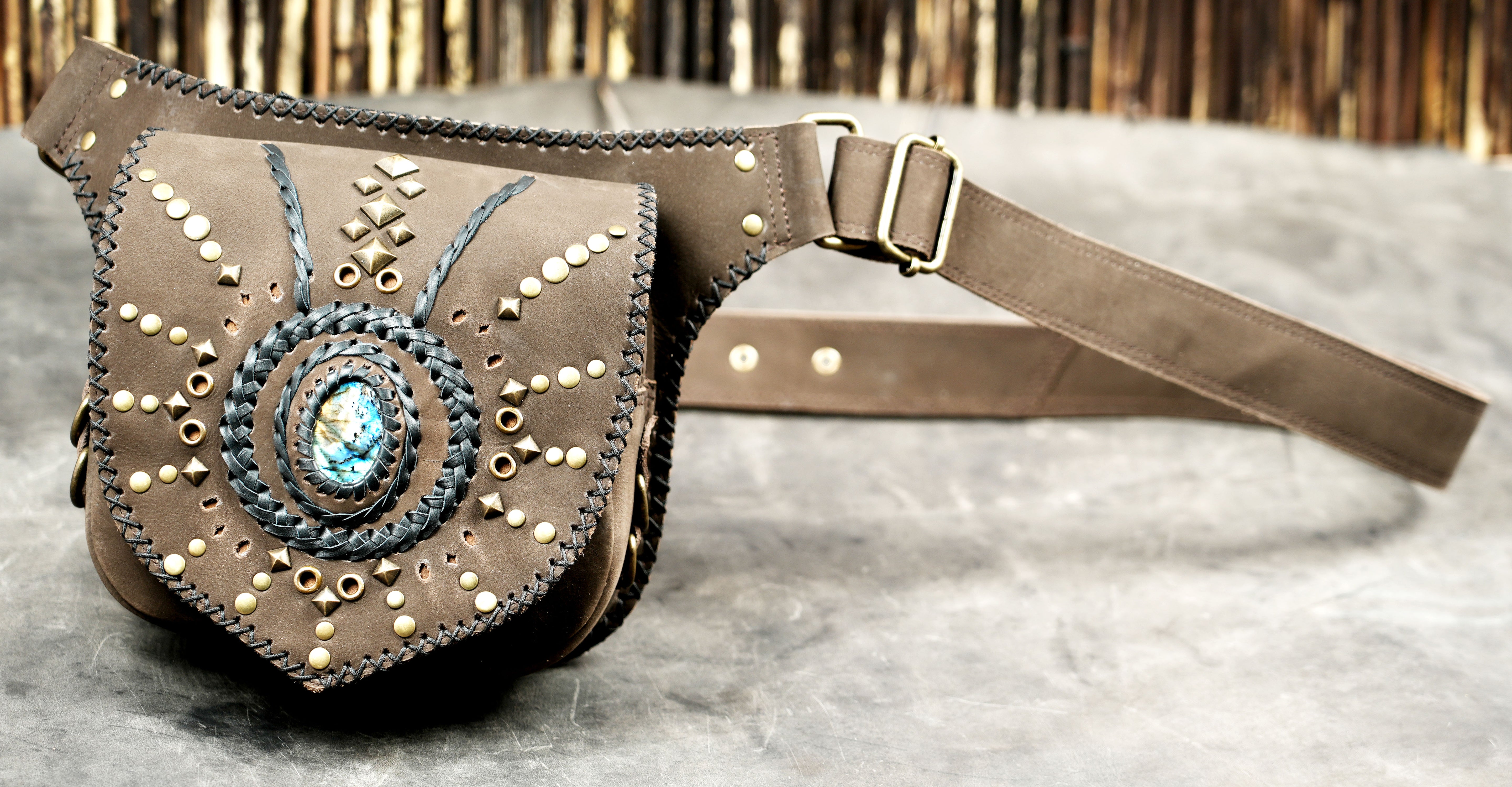 Bohemian leather fanny pack with woven stone detail