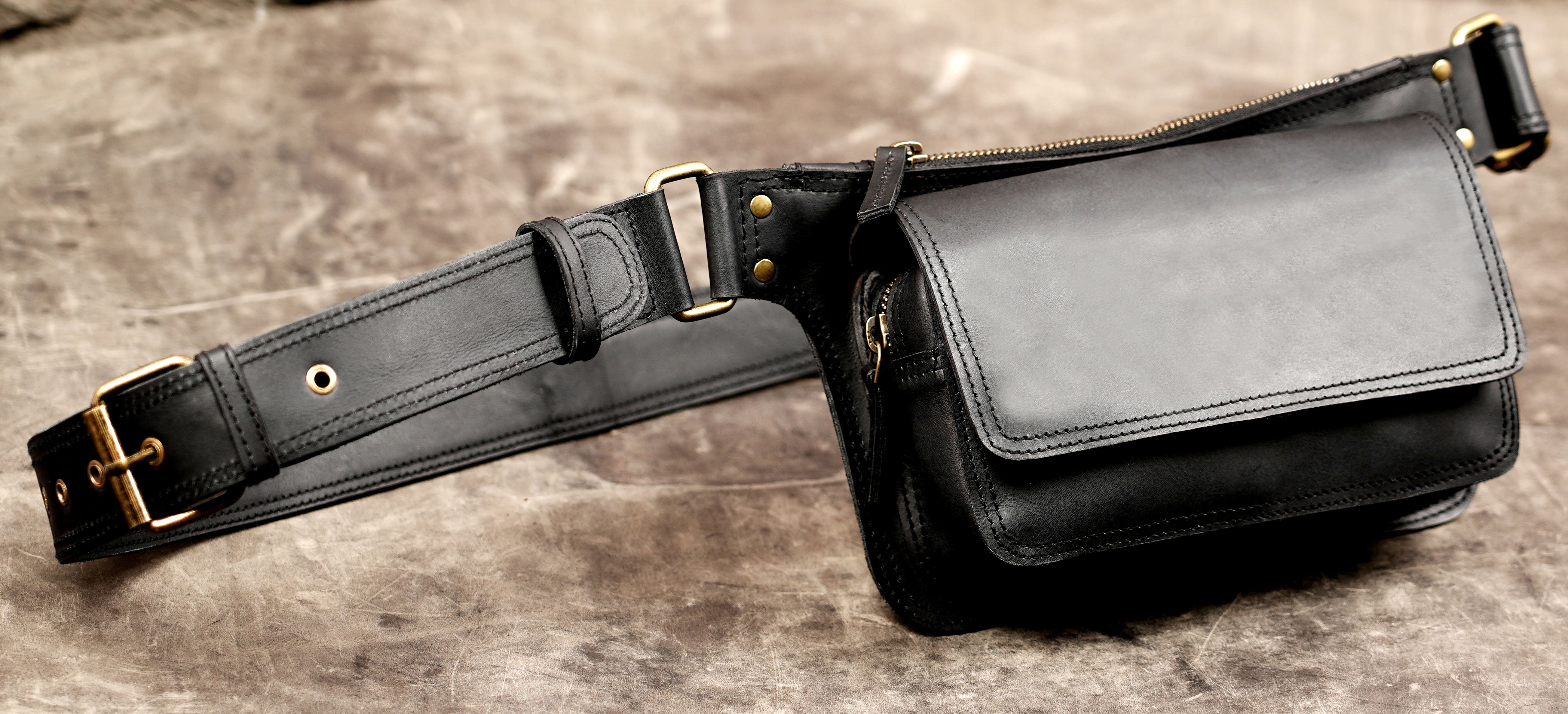 Black leather travel waist bag with adjustable belt