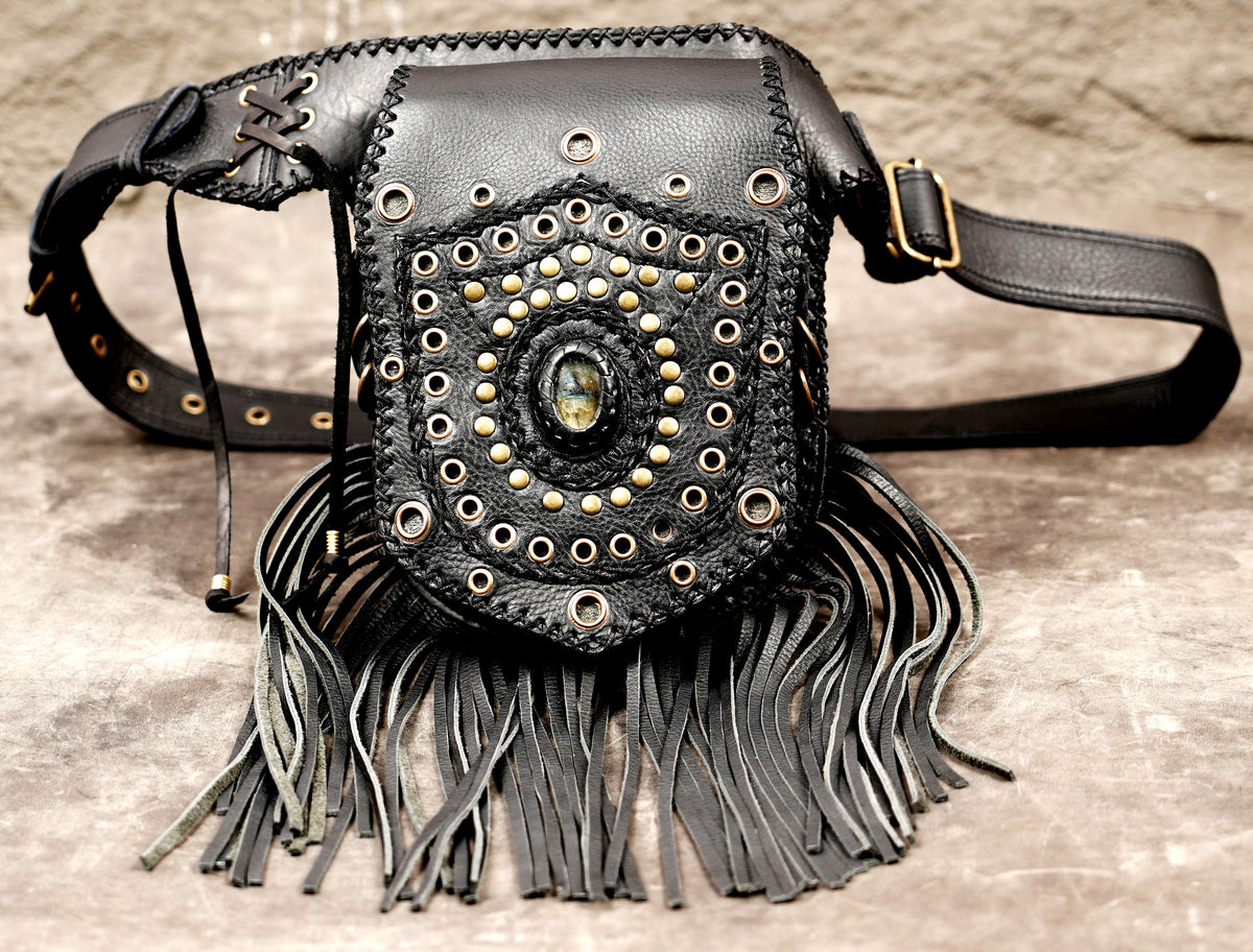 Handmade leather utility belt with fringe detailing
