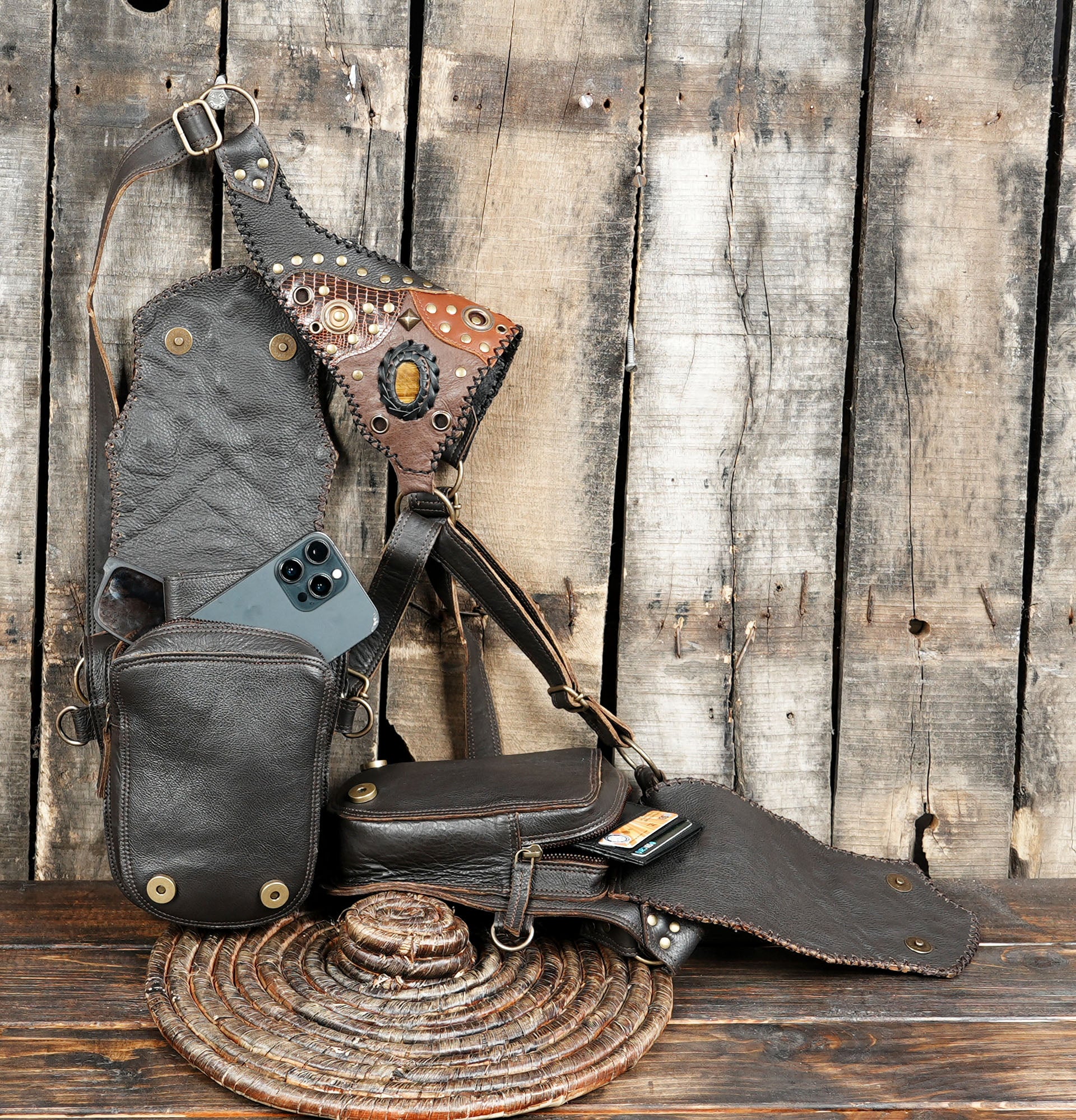 Leather belt holster with handcrafted detailing and rustic wood backdrop