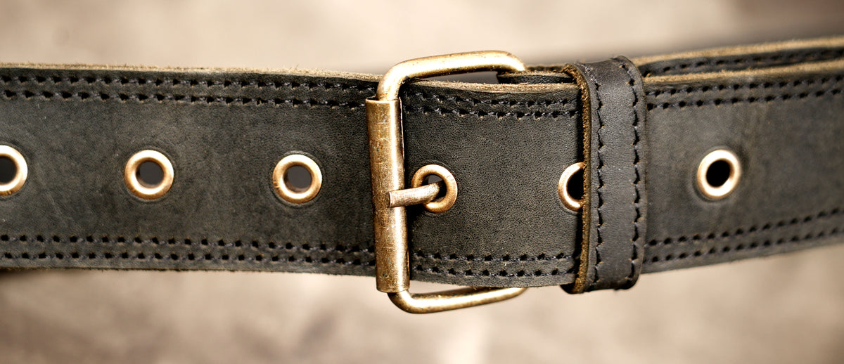 Rugged leather adventure belt with adjustable waist strap