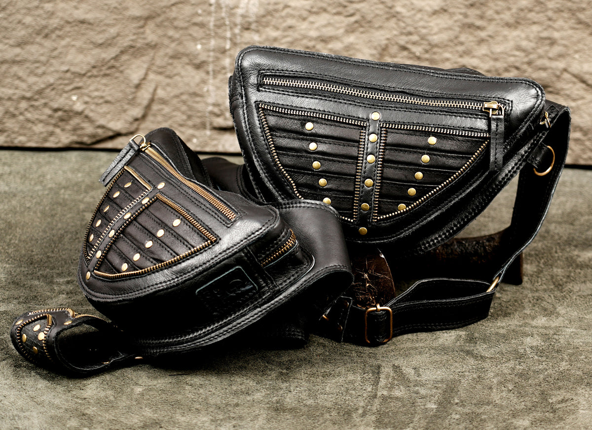 Black leather utility shoulder bag with secure storage pockets