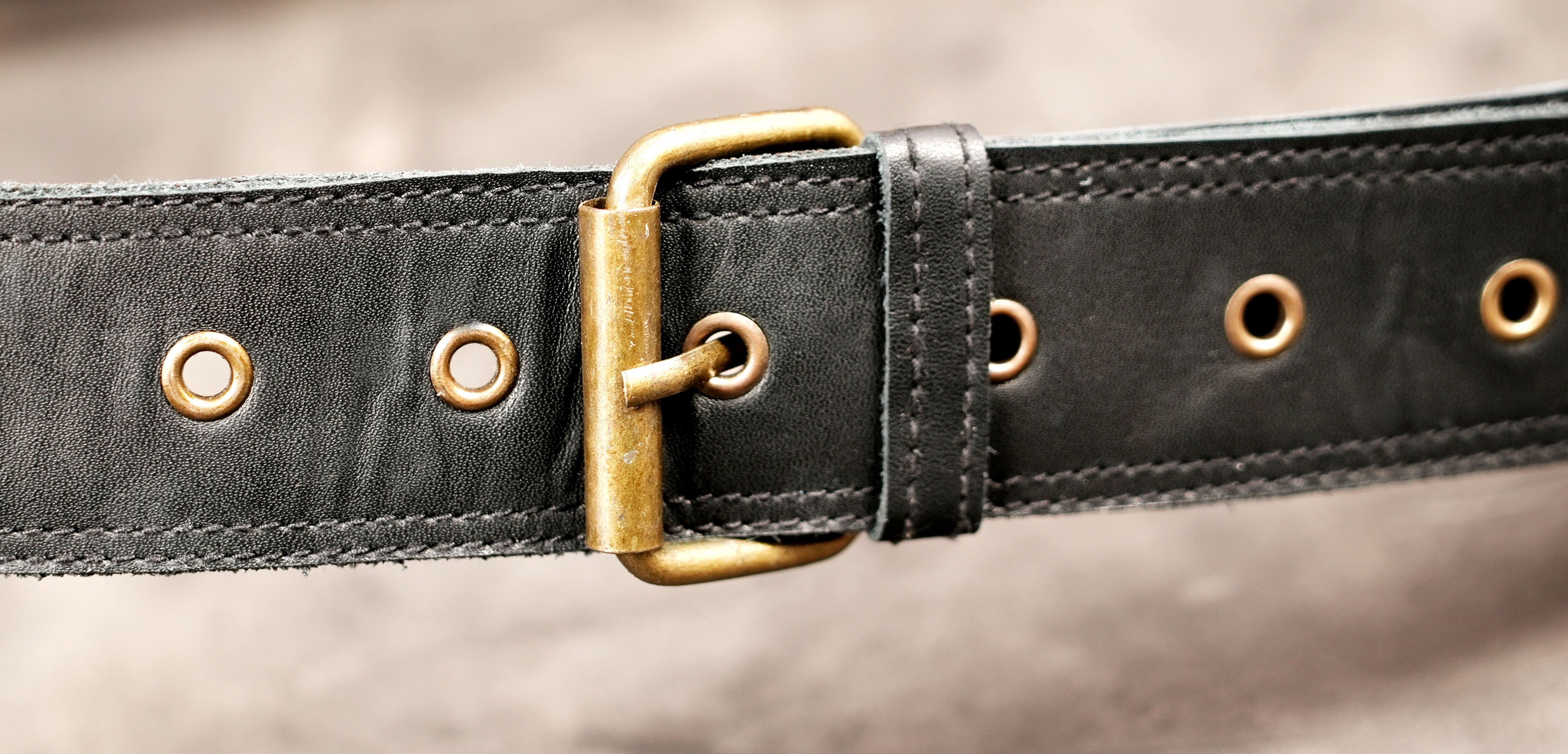 Artisan leather hip bag with braided gemstone setting