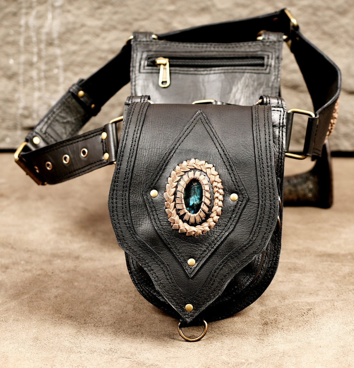 Handmade leather waist bag for festivals with dual pockets and stone decoration