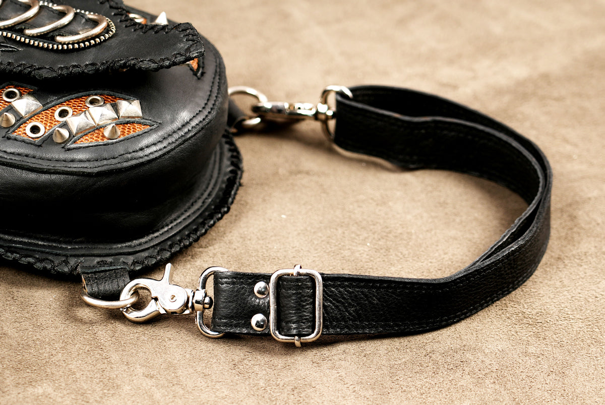 Unisex black leather leg bag with swivel clasp connectors