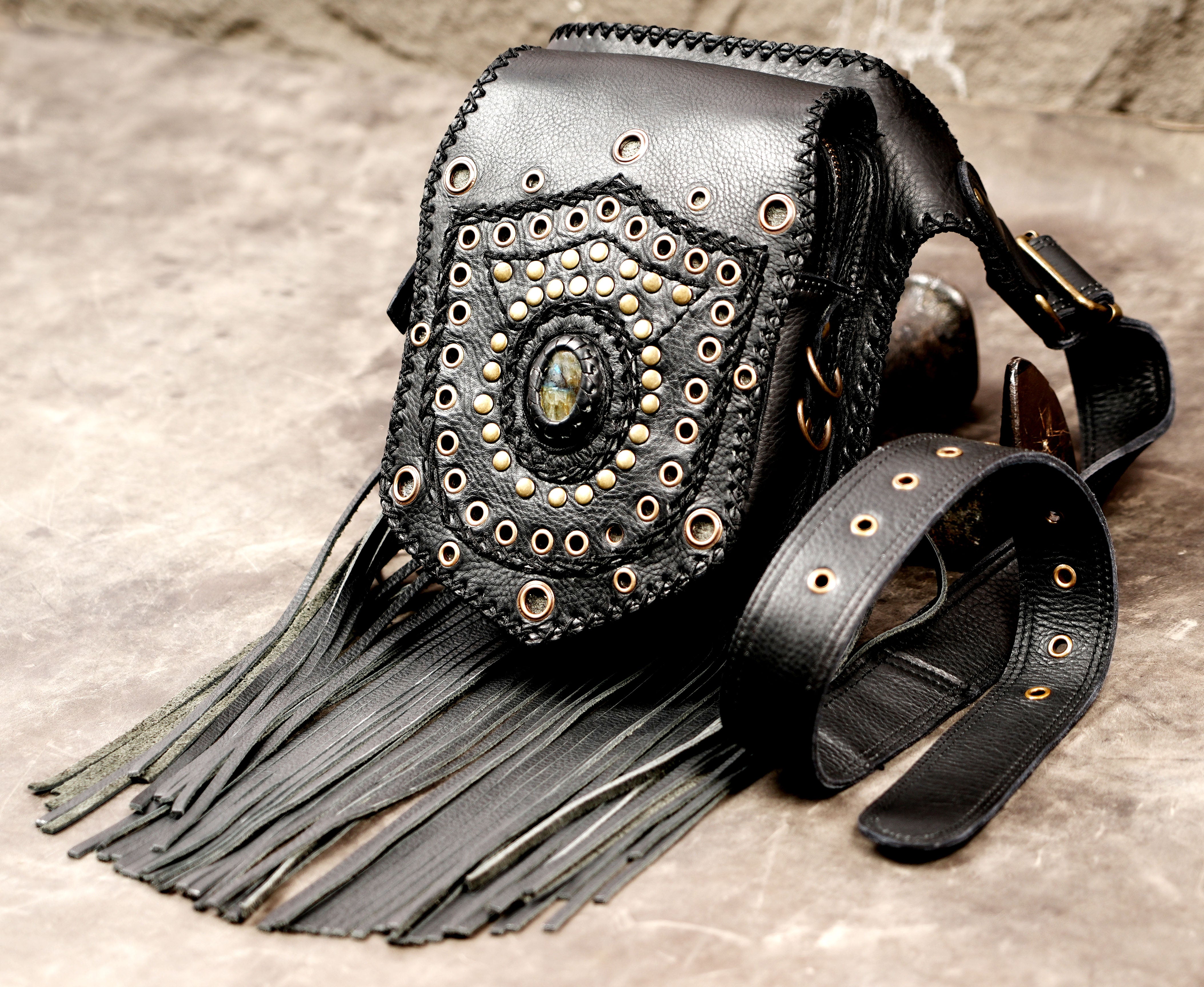Rustic leather waist belt with flowing fringe
