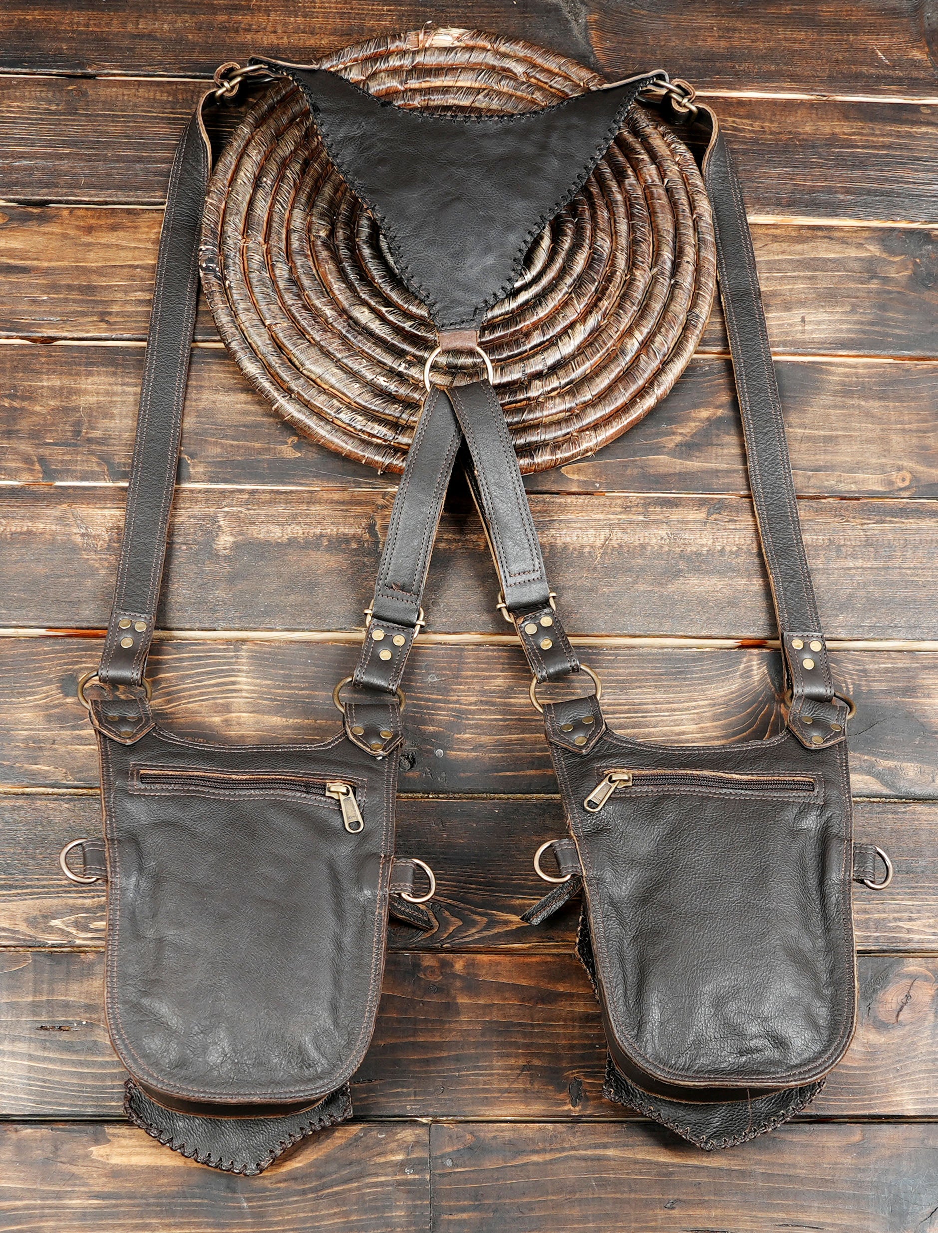 Bohemian style leather holster bag with intricate patchwork design