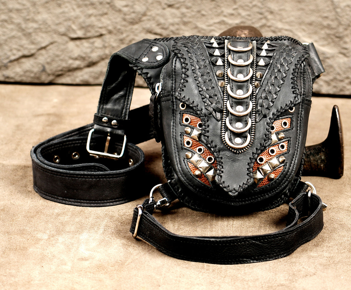 Black leather fanny pack with metal spikes and eyelets