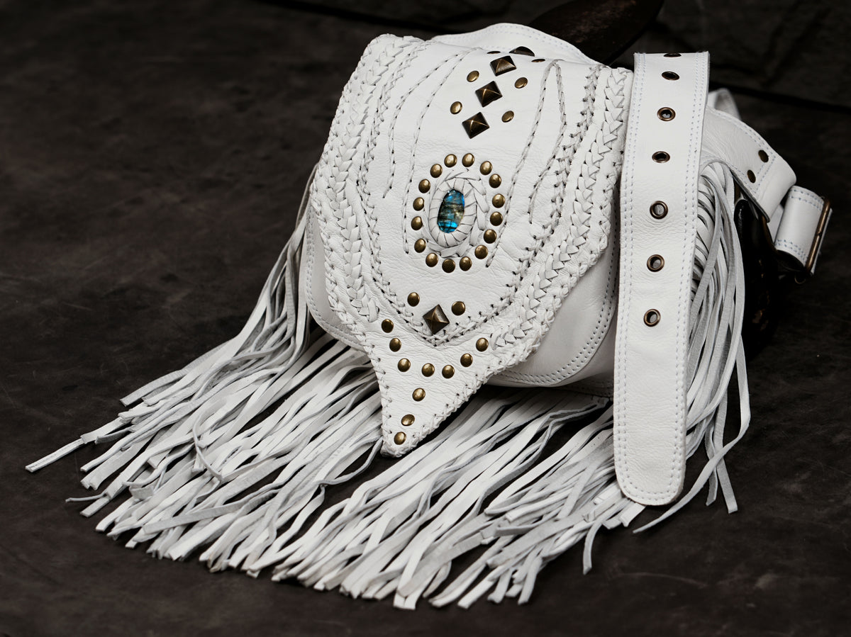 White leather festival fanny pack with boho fringe detailing

