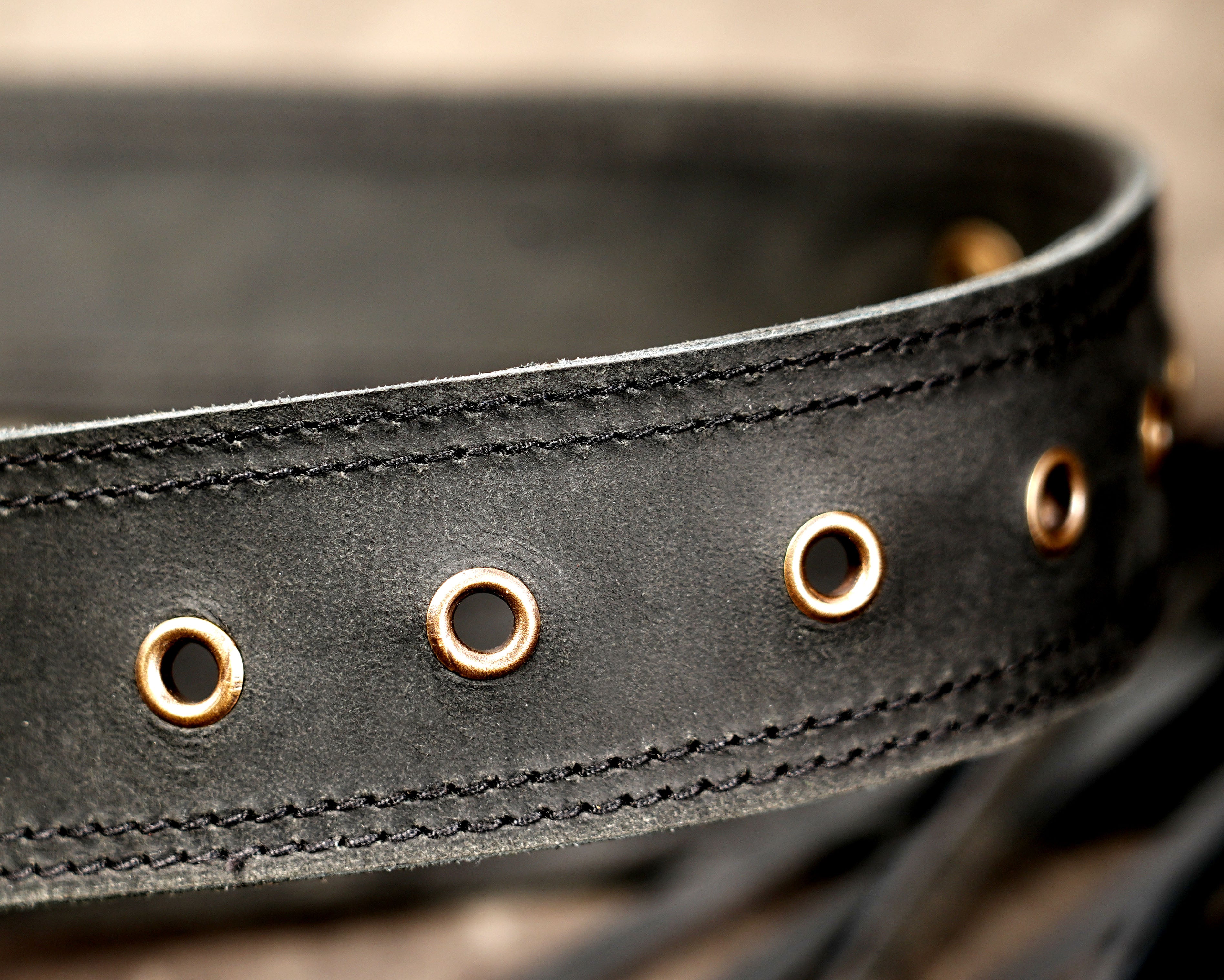 Vintage style black leather bum bag with fringe details