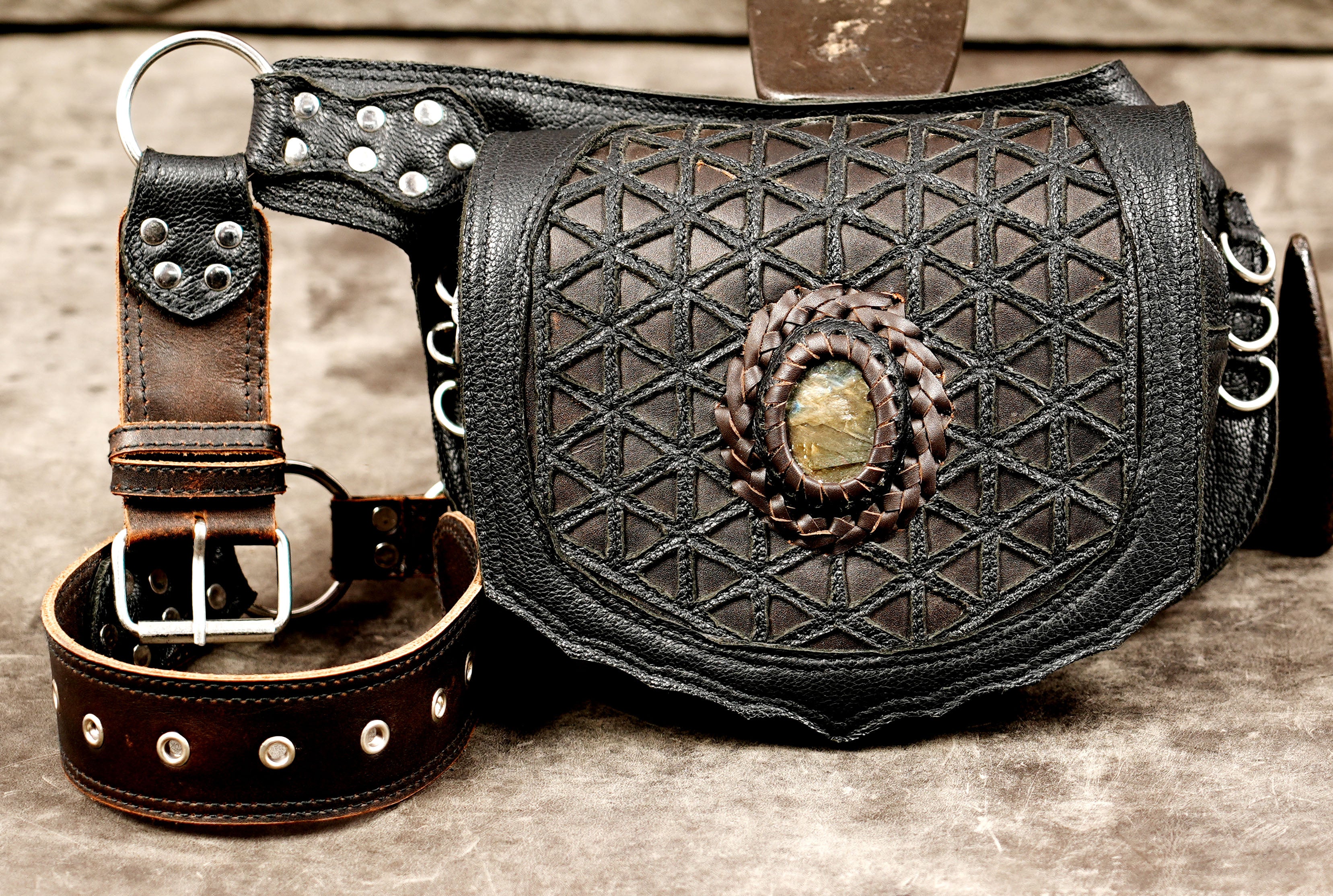 Boho leather waist bag with crystal accent and geometric flap for outdoor adventures