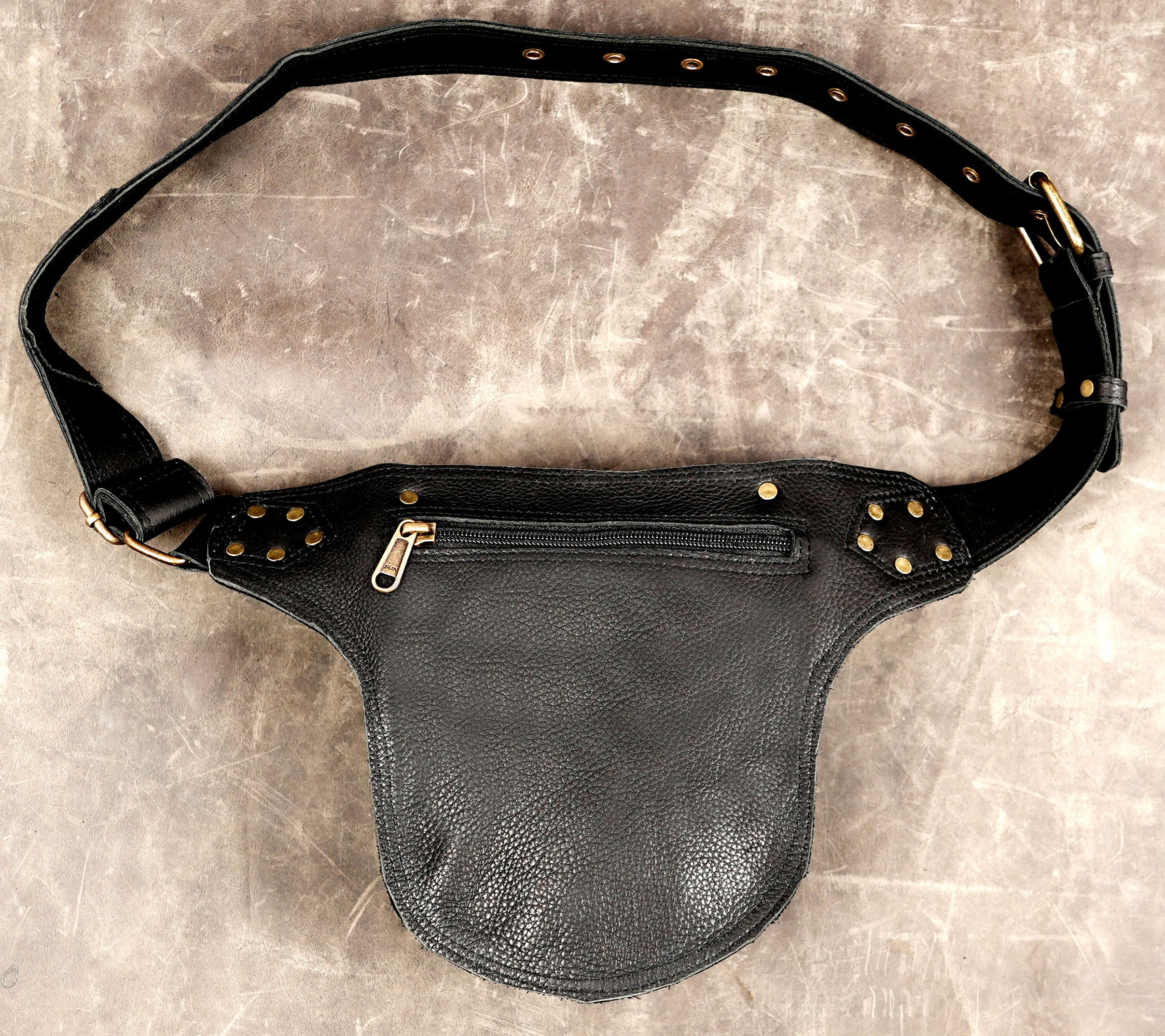 Adjustable black leather hip bag for concerts and festivals