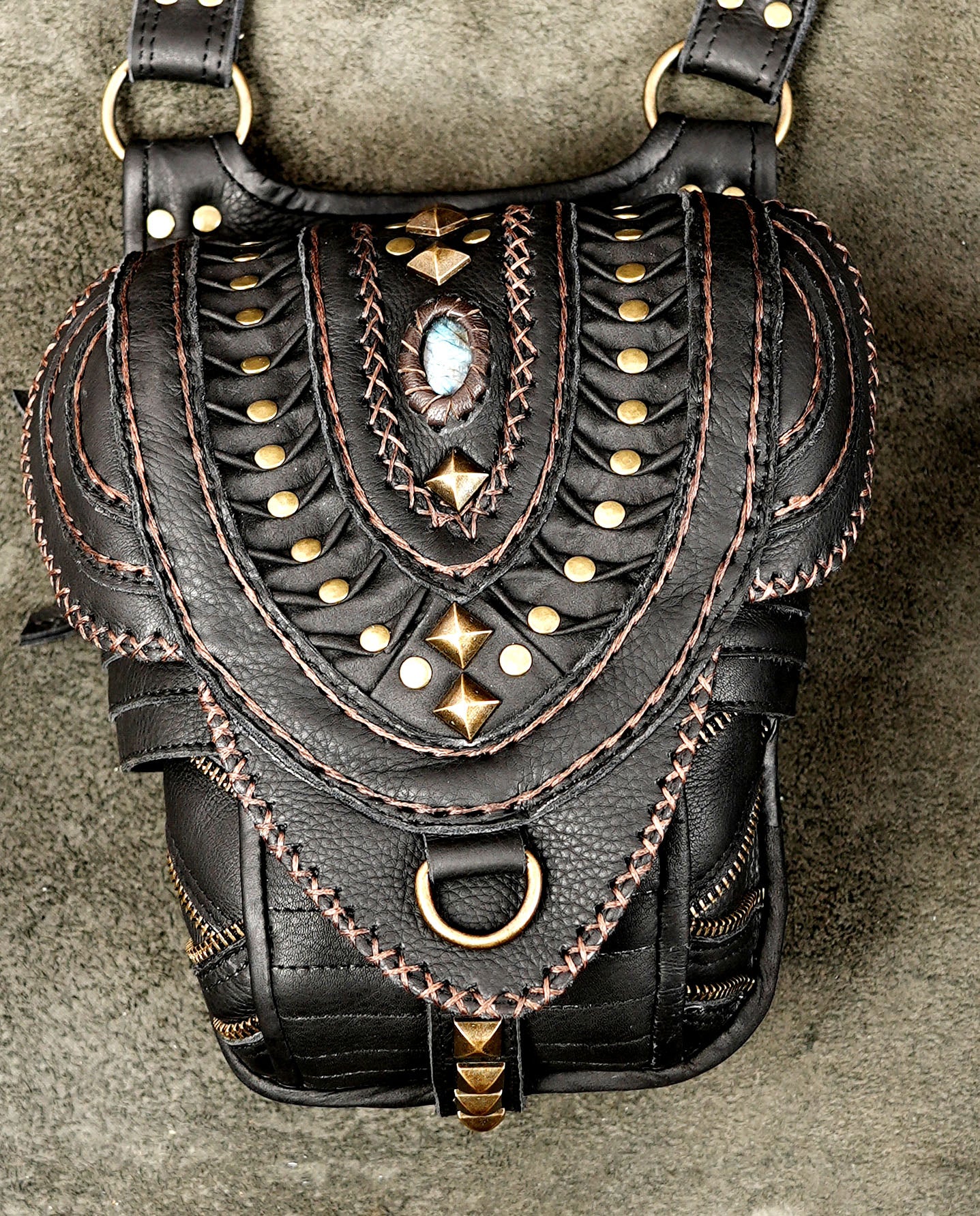 Adjustable dual-pocket leather harness bag with antique brass hardware