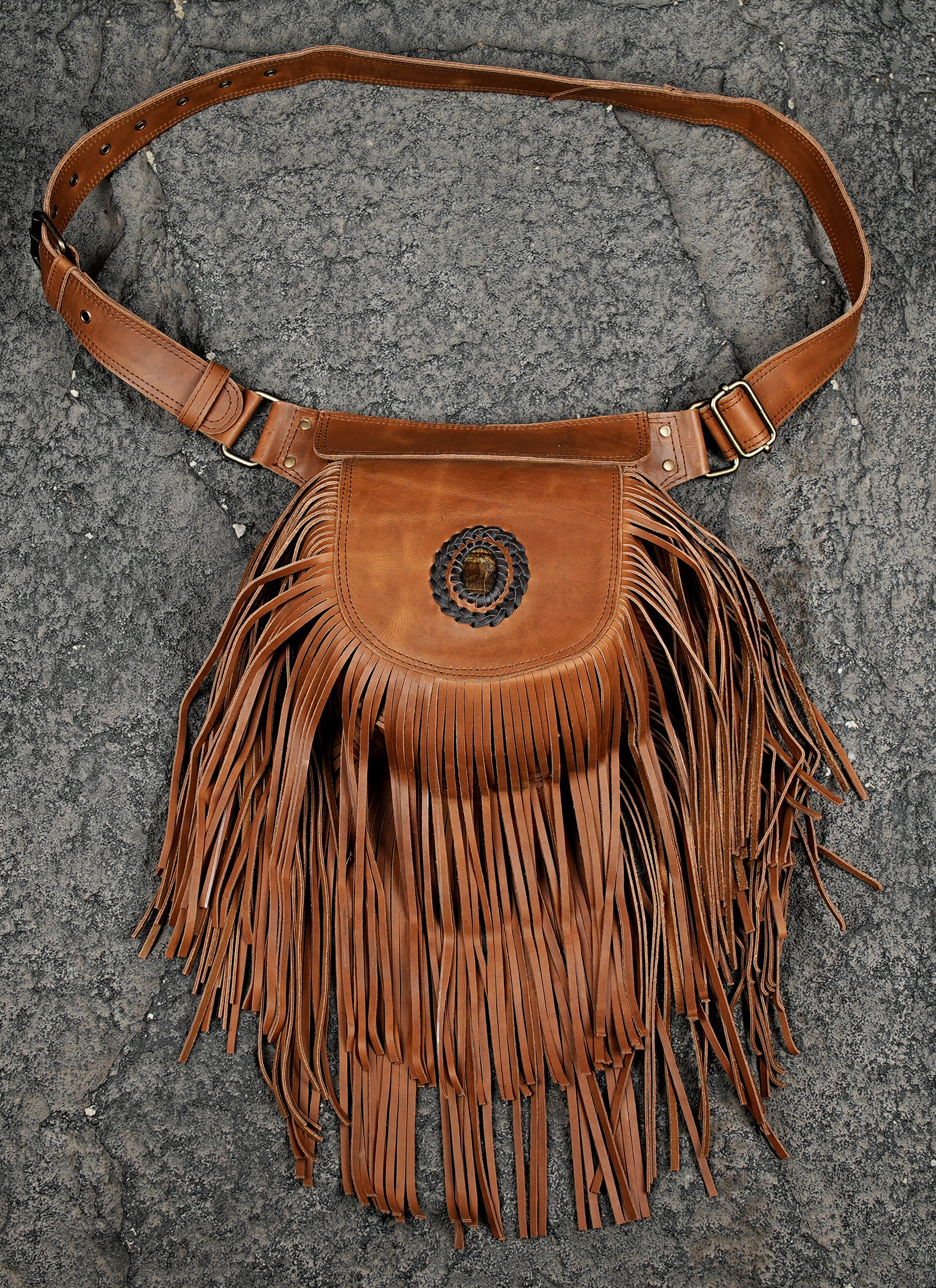 Adjustable leather belt bag with tiger eye gem and fringe