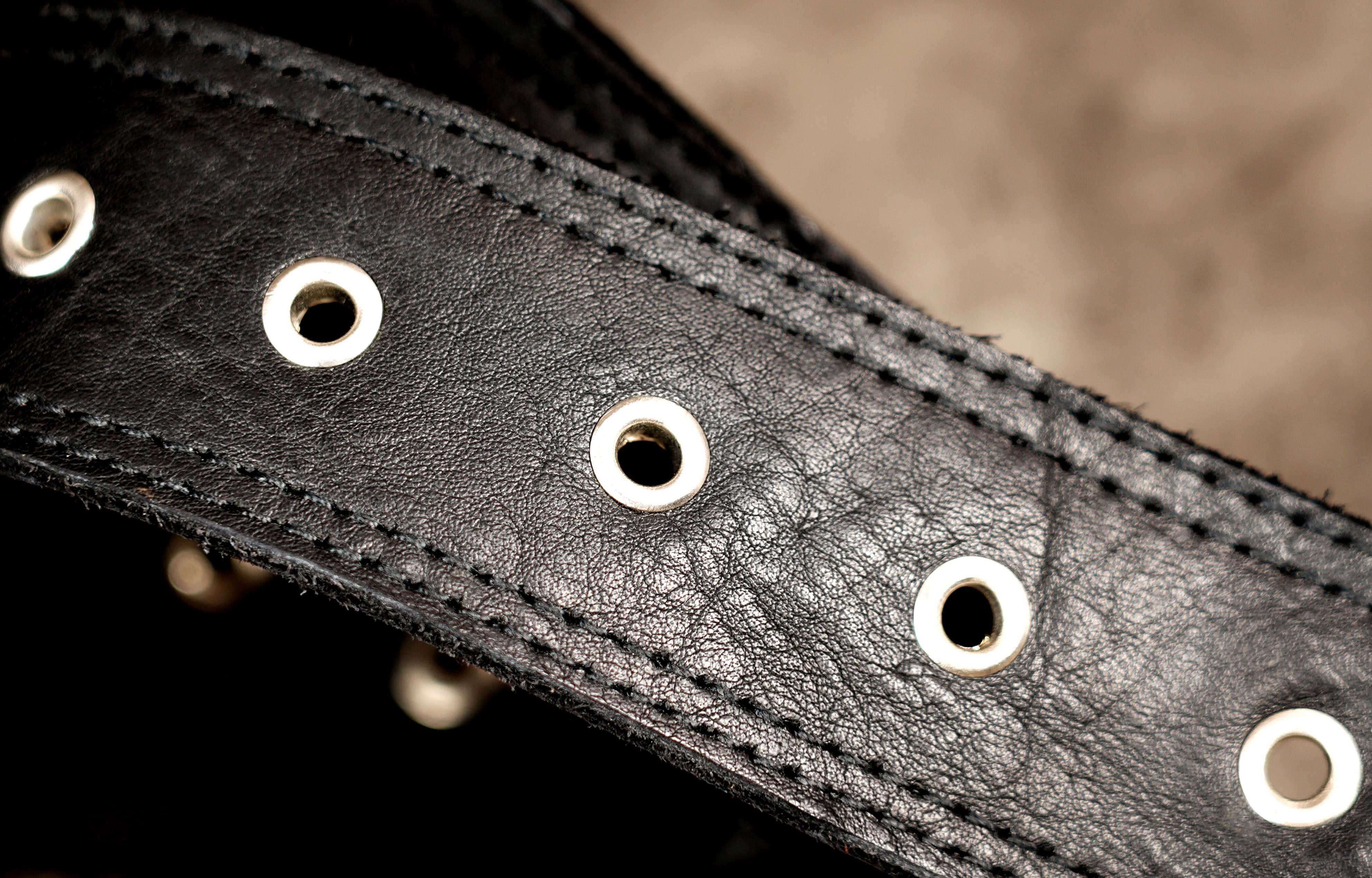 Adjustable leather belt bag with turn lock closure
