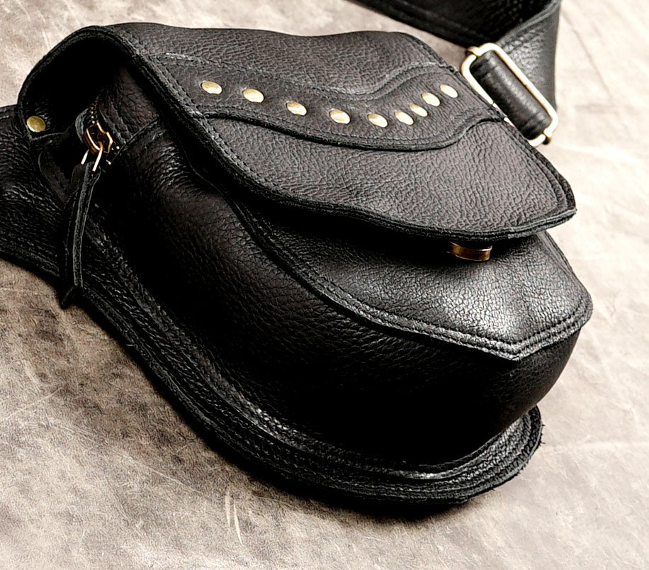 Adjustable leather belt pouch with antique brass studs and buckle