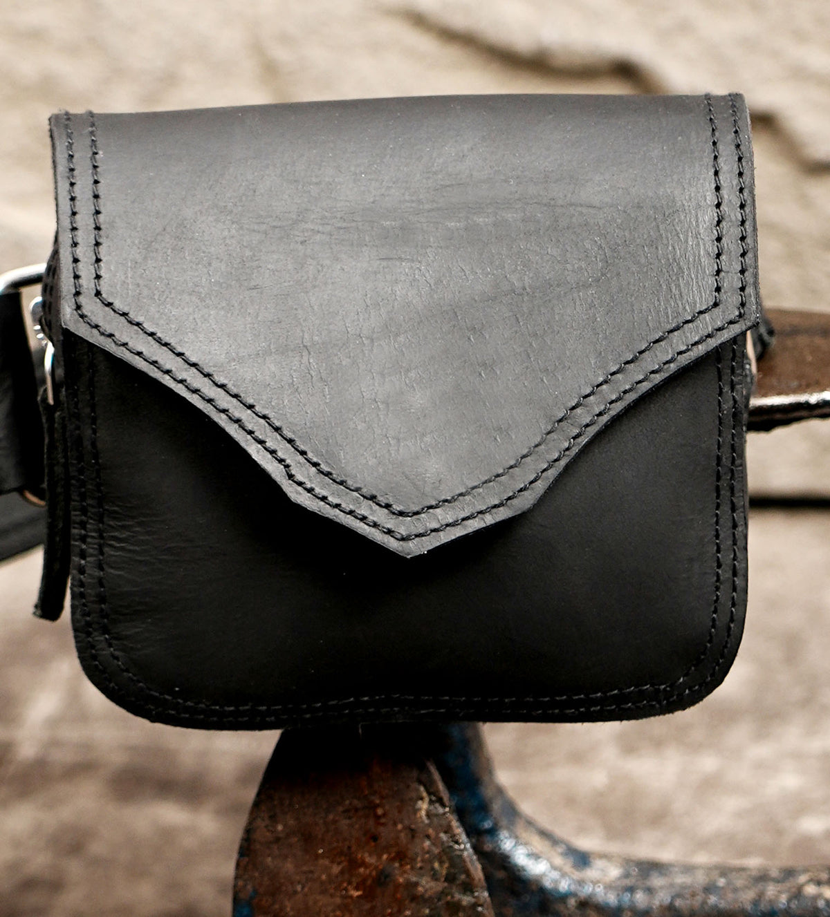 Adjustable leather hip bag with attached side pouch