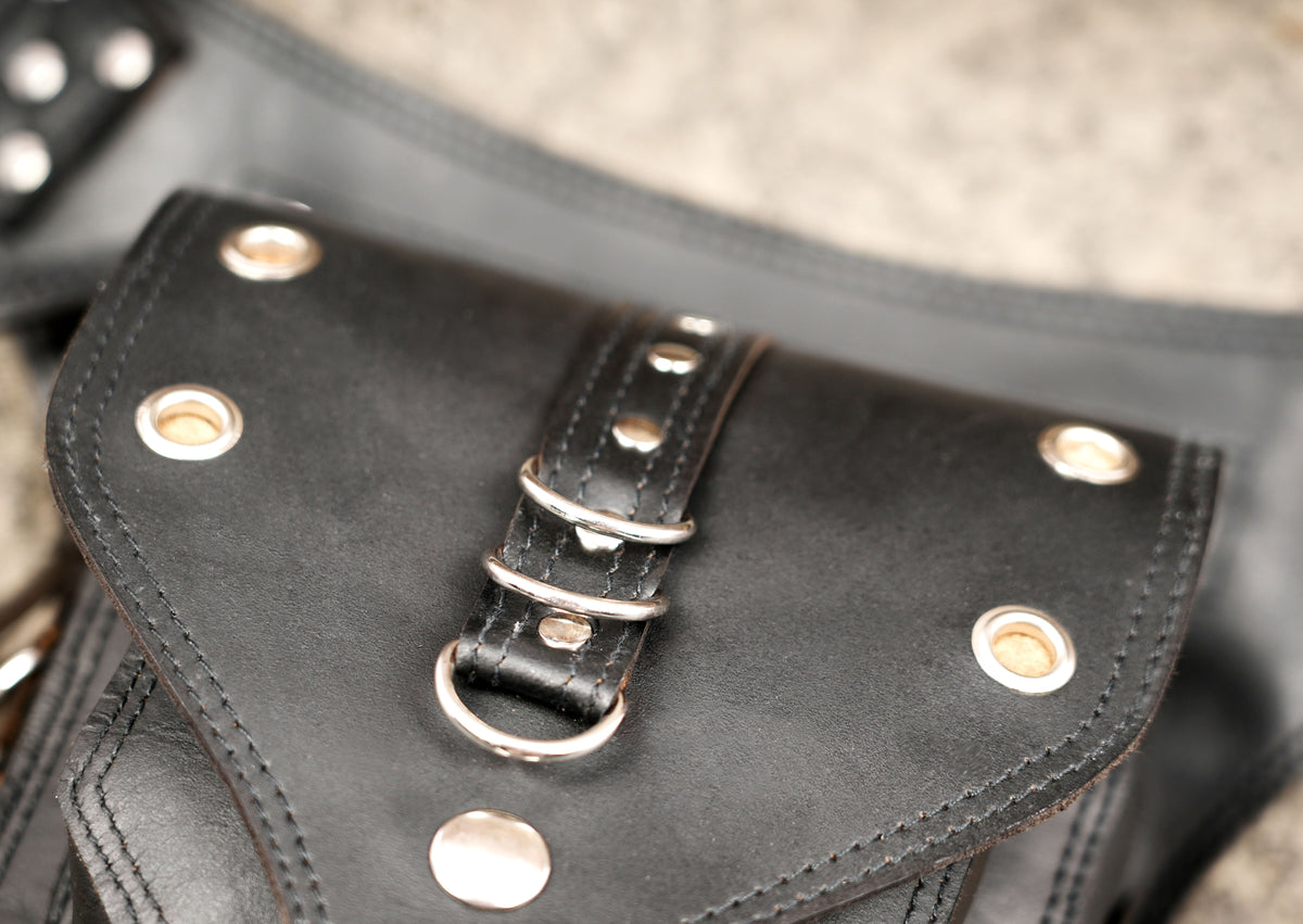 Adjustable leather hip bag with zip pocket and studs