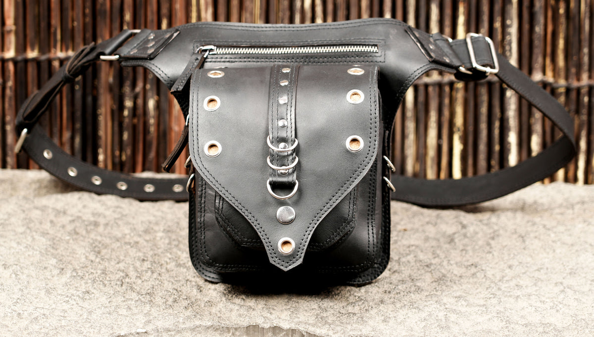 Adjustable leather waist bag with D-ring hardware detail