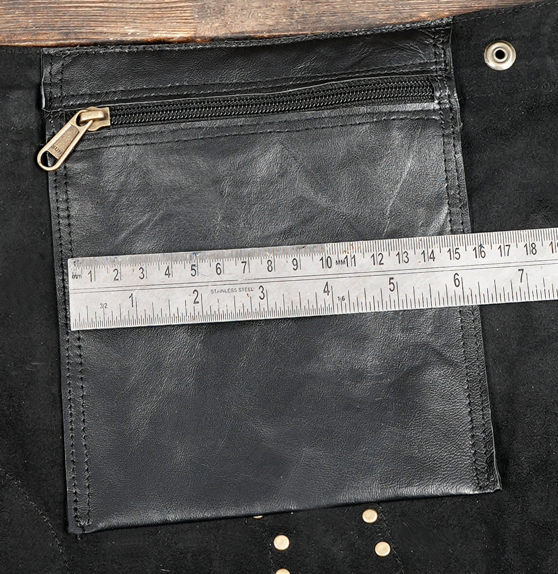 Adjustable leather wrap skirt with buckle waist closure