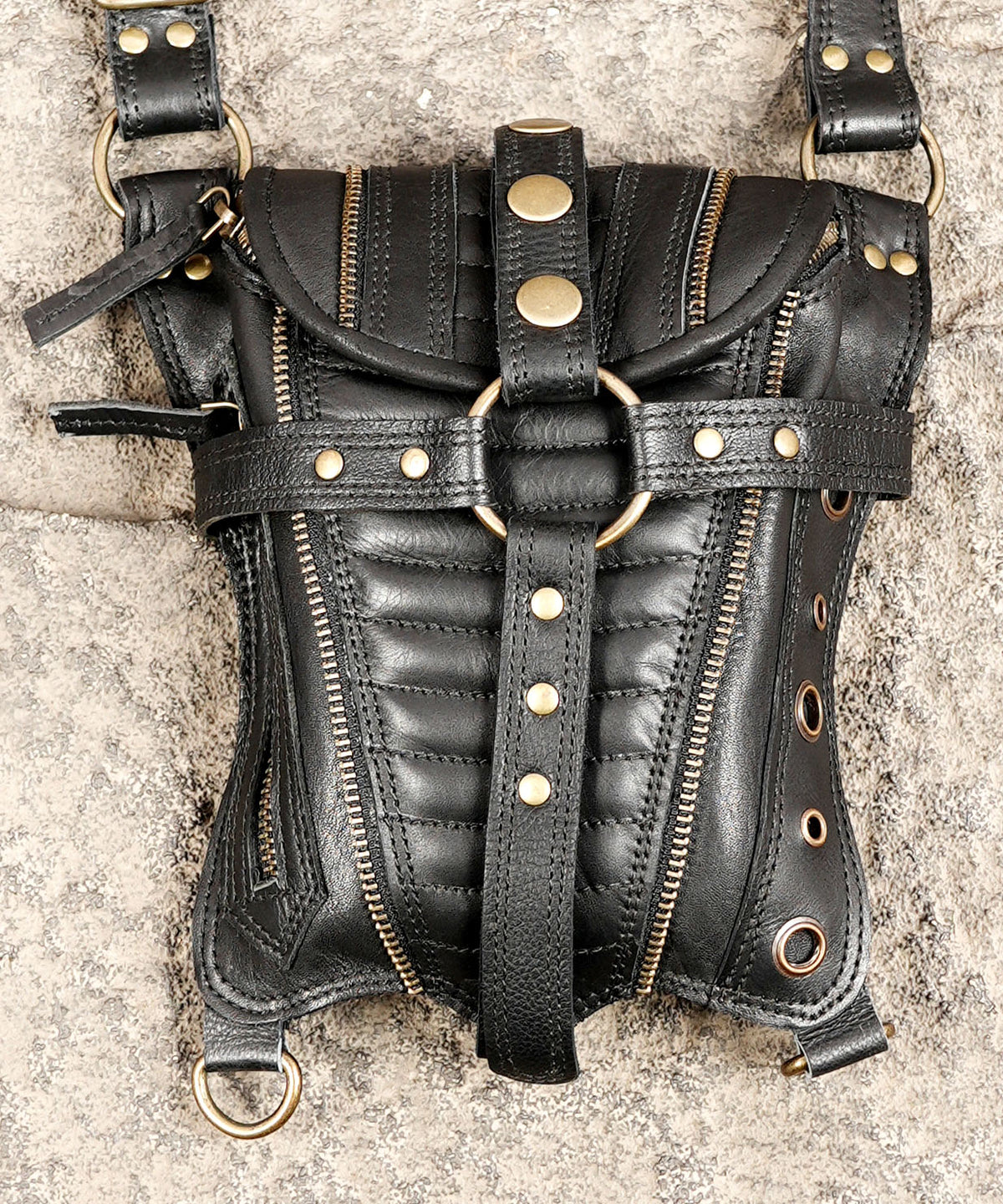 Handmade black steampunk harness bag with two front pouches and decorative metal studs