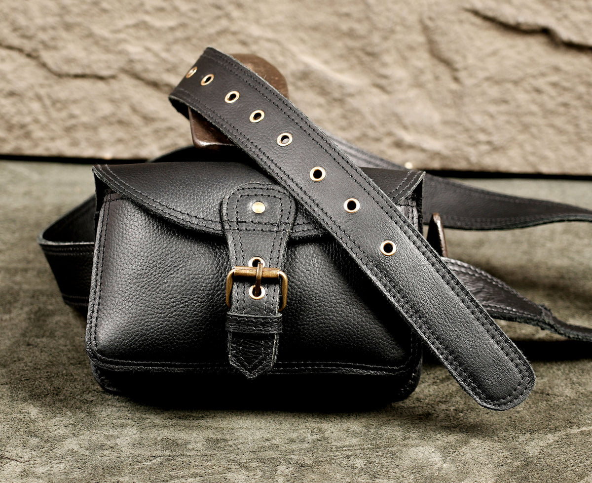 Elegant black leather belt purse with buckle flap design