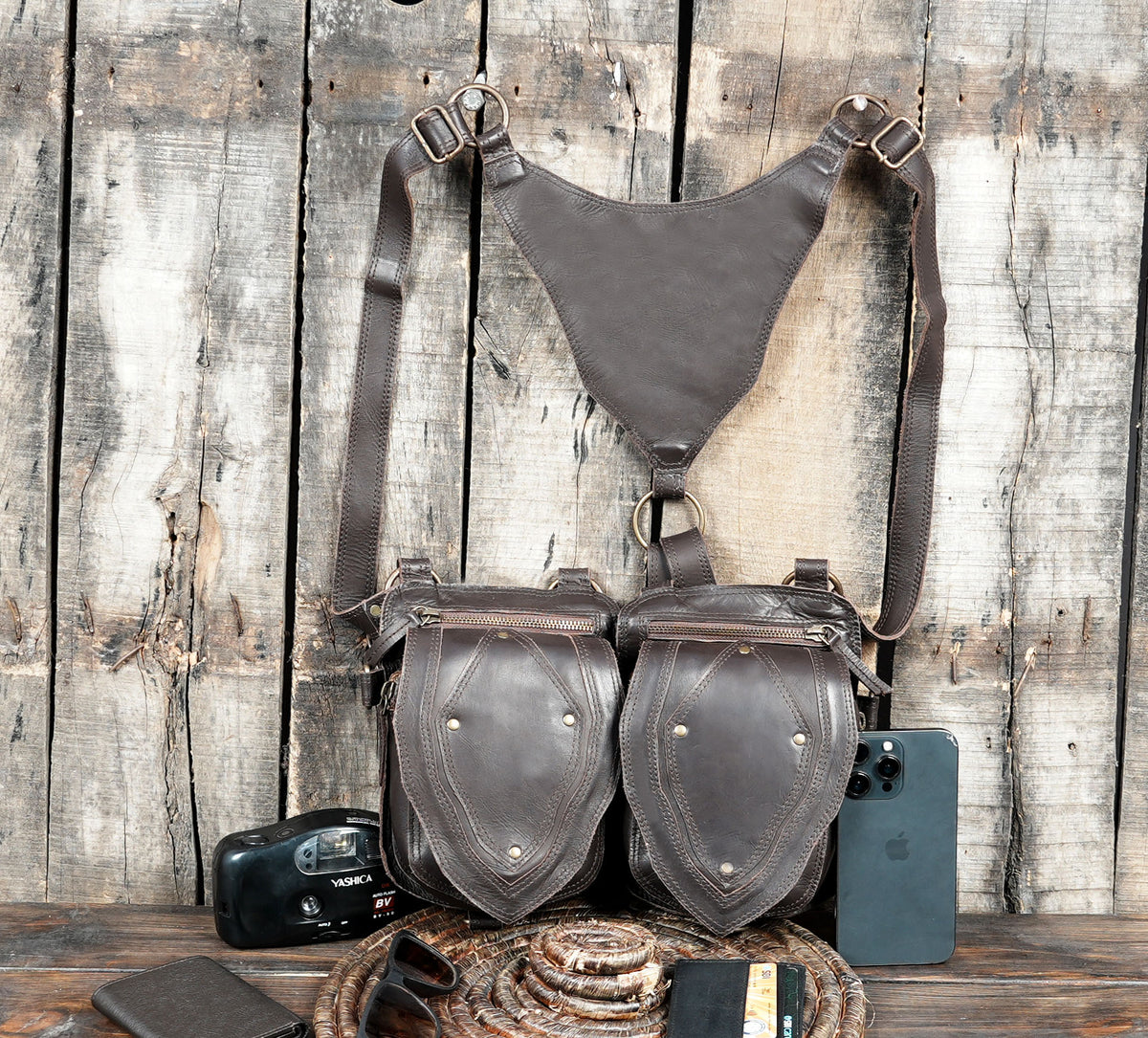 Handcrafted brown leather double pouch harness with antique brass tone metal clips
