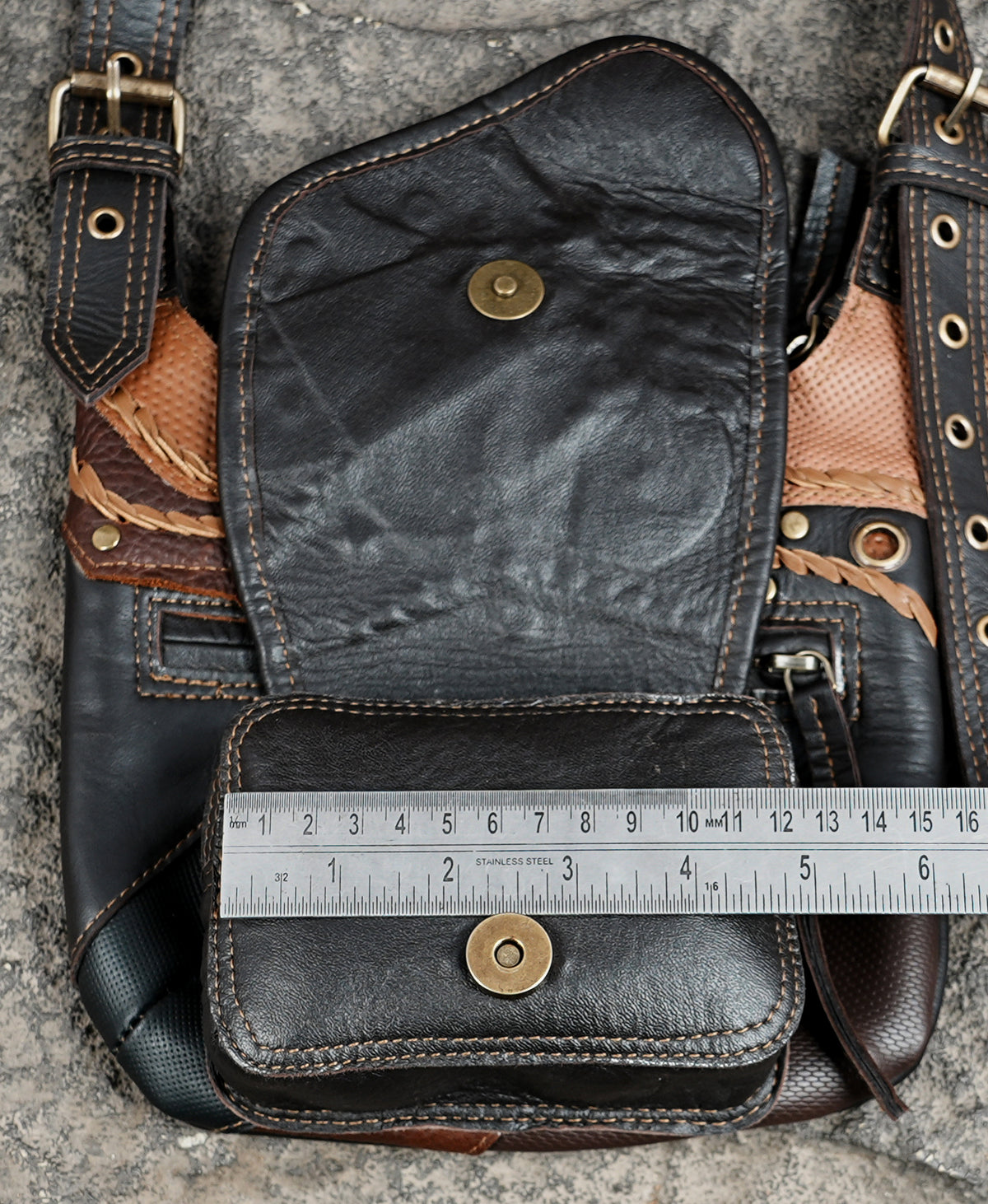 Leather hip bag harness with adjustable shoulder straps and brass buckles