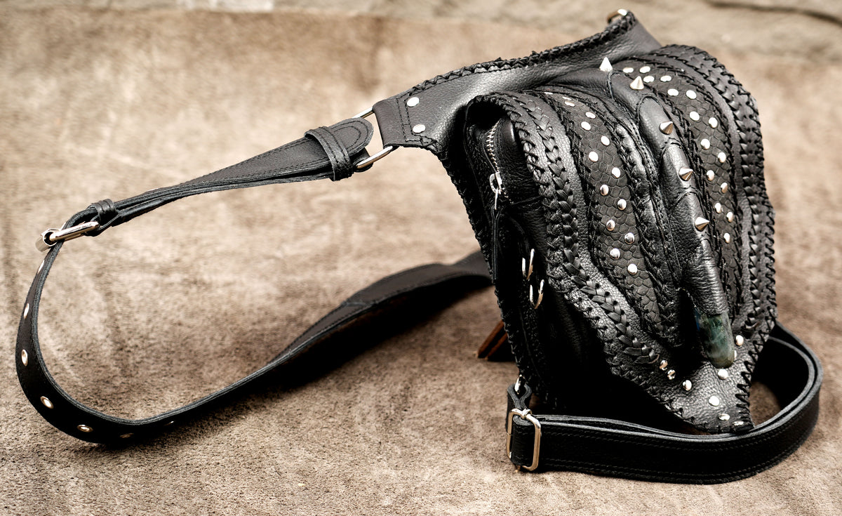 Alien inspired leather thigh bag, spike close up