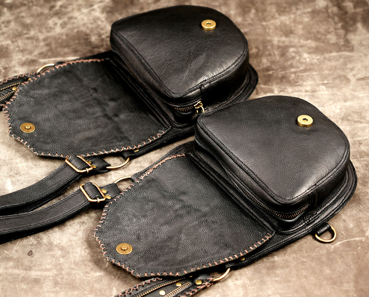 Black leather utility pouch set with detachable straps and metal fittings