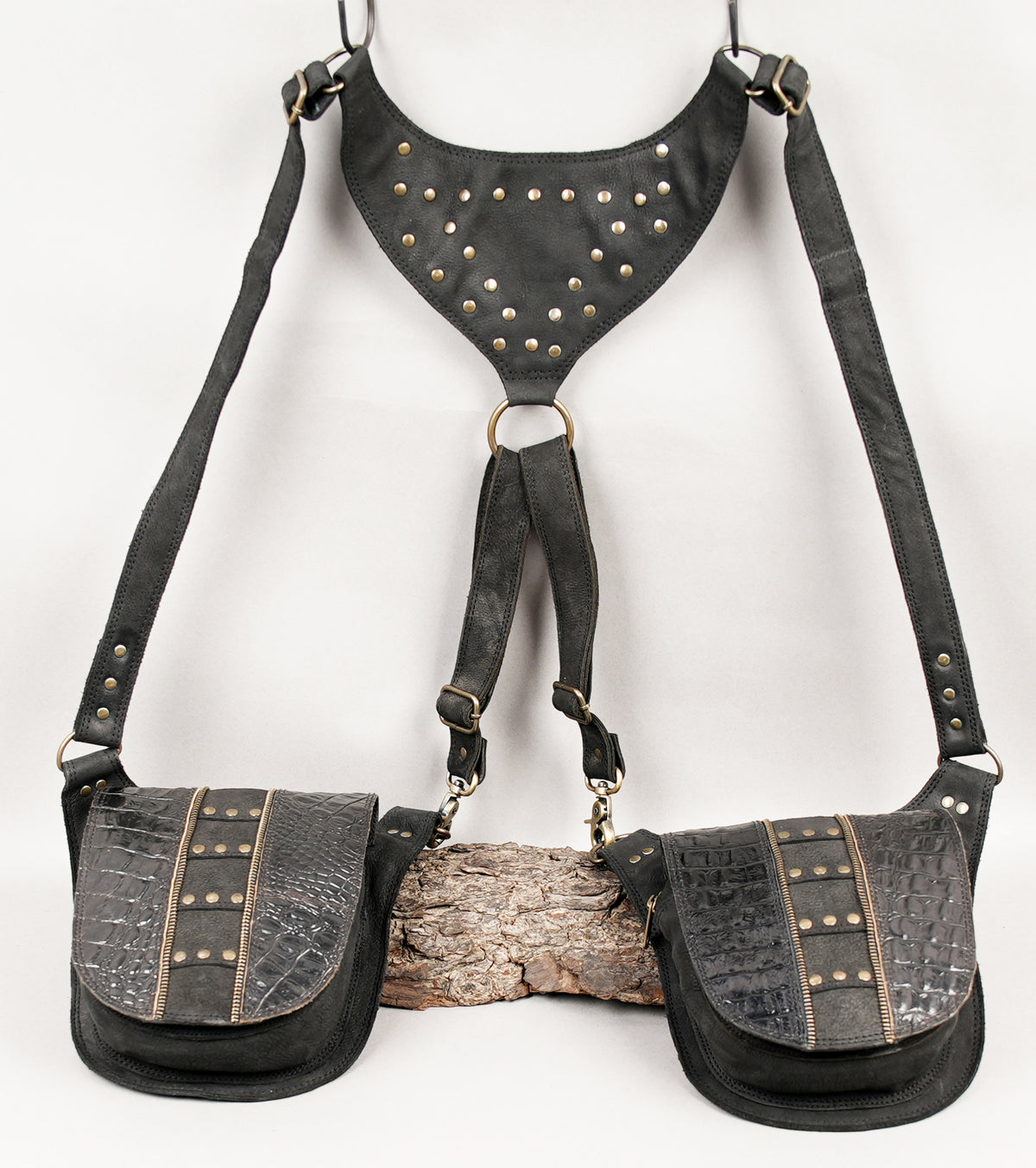 Steampunk double hip bag harness in black leather with textured panels and studded straps
