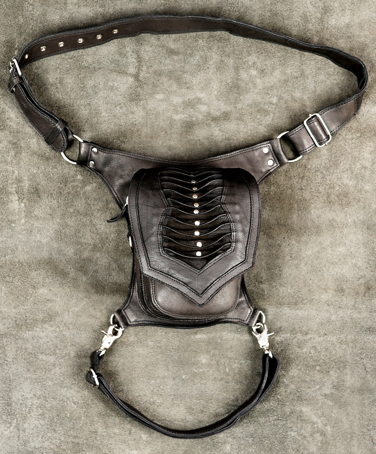 Armor plated leather leg bag with ribbed stud panel