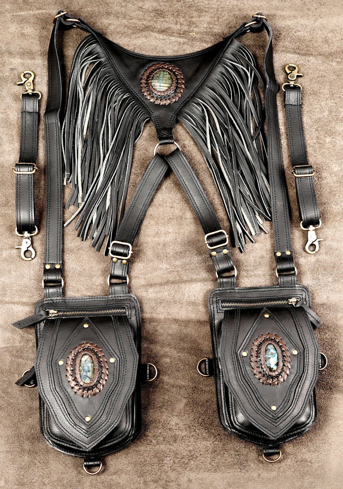 Boho festival leather holster bag with fringe back yoke and natural stone cabochons for hands-free wear.