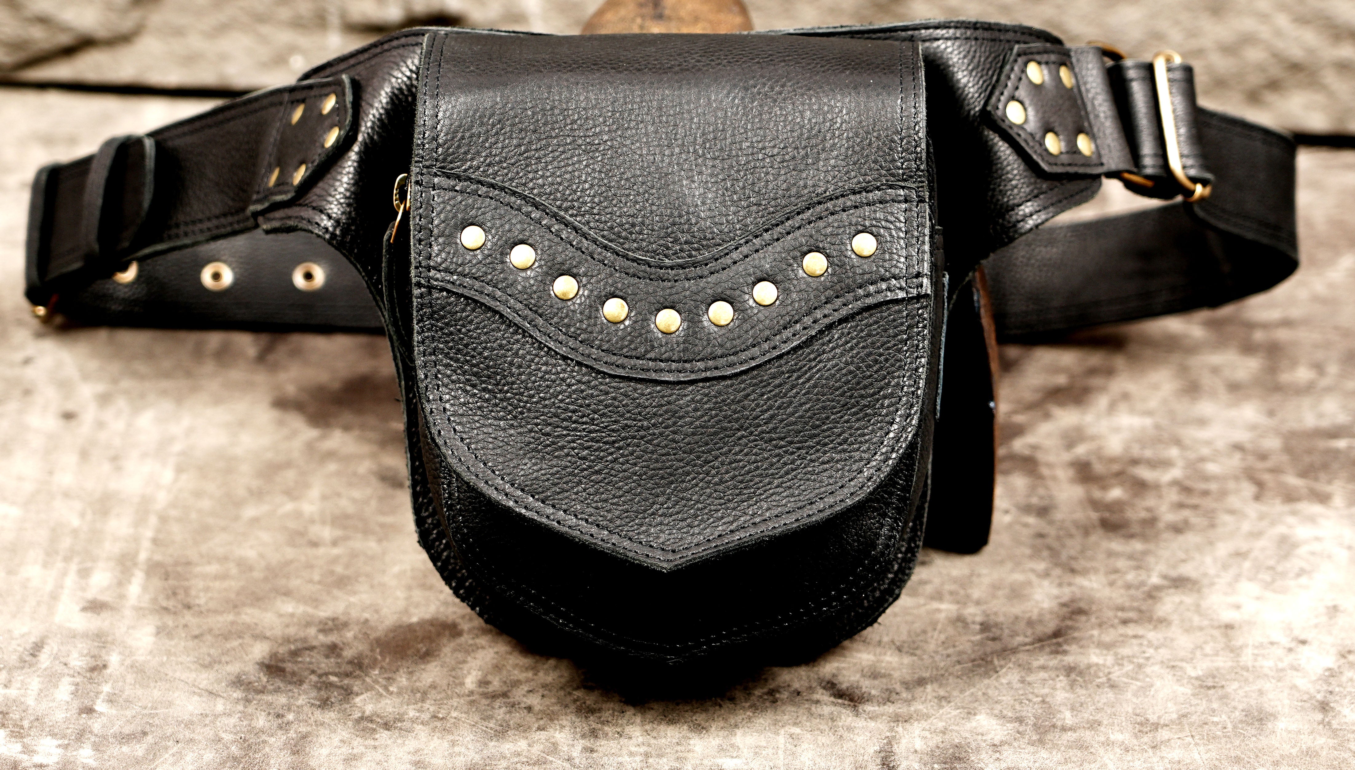 Artisan-made leather hip bag for hands-free travel and events