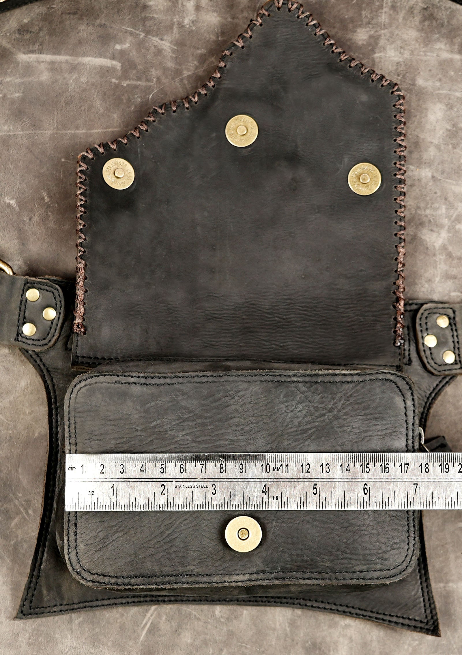 Artisan leather utility bag featuring a labradorite centerpiece