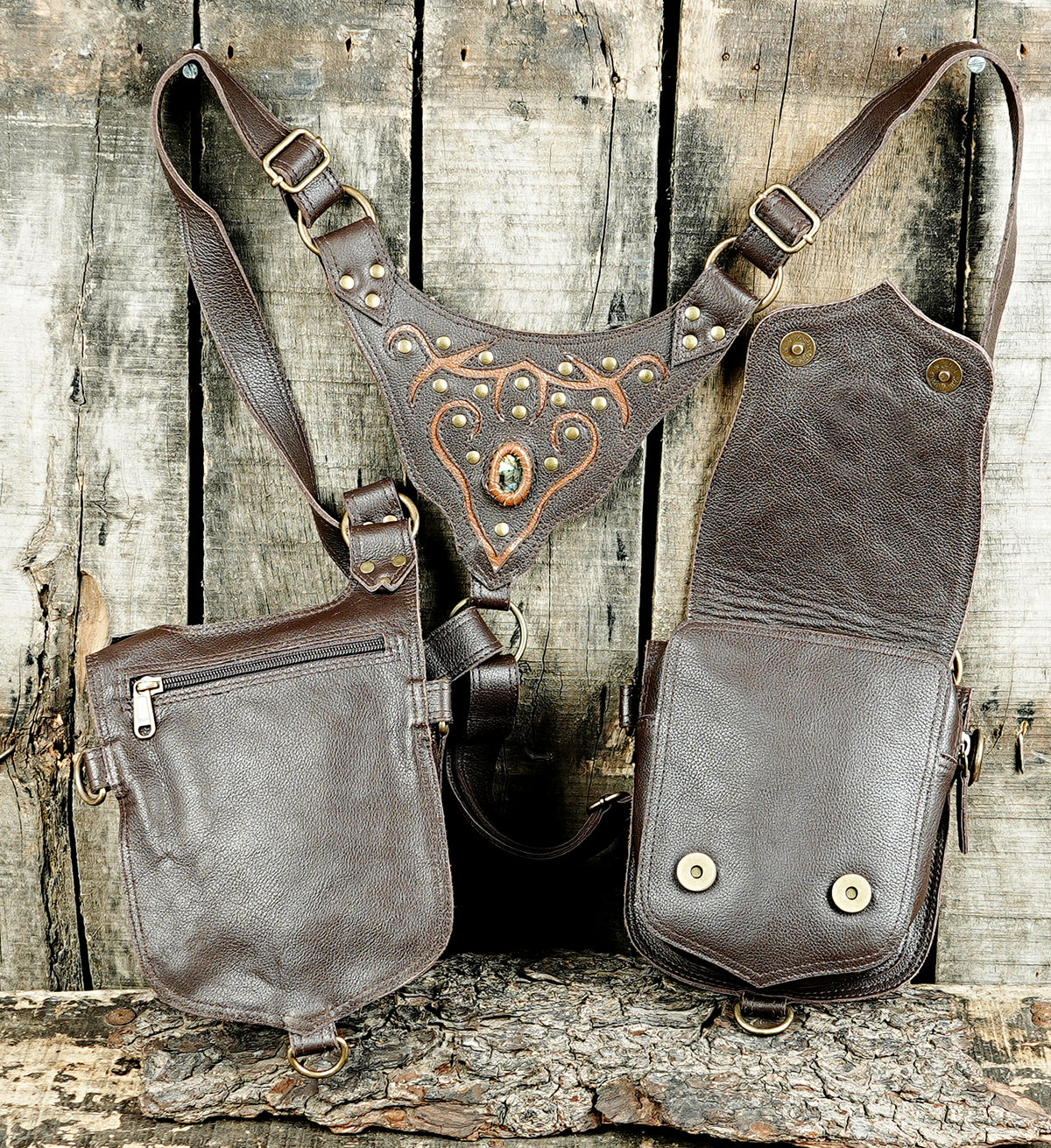 Unisex steampunk shoulder bag with black leather pouches and gemstone embellishments