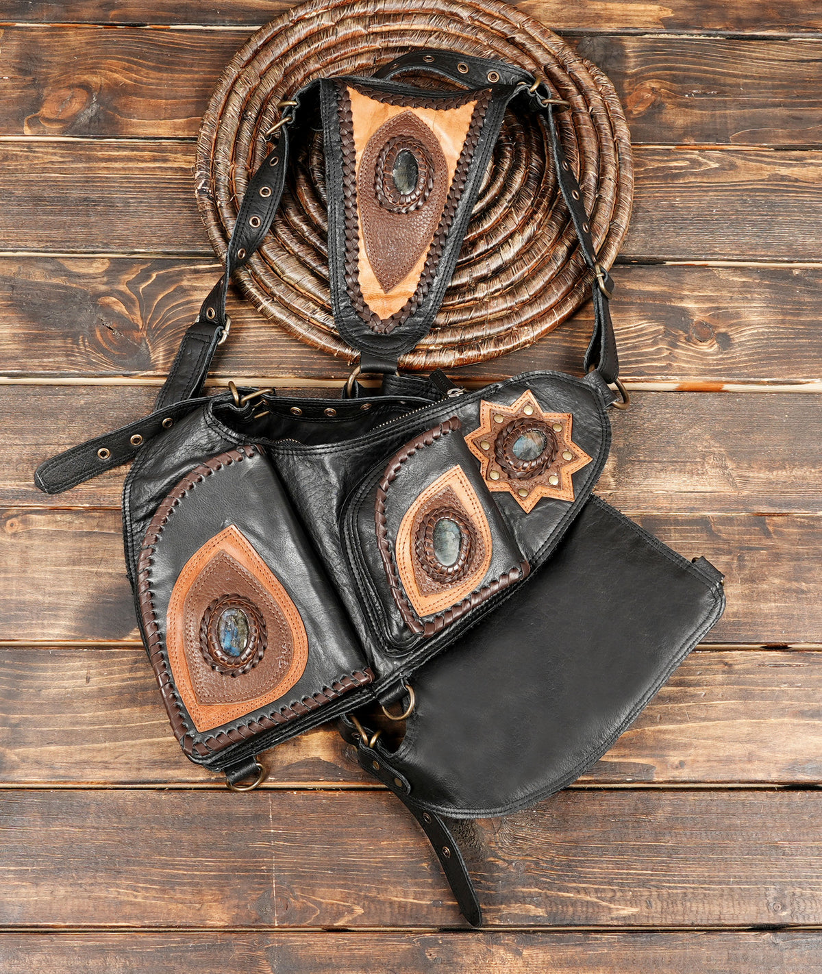 Black leather utility harness with multiple pockets for festival essentials