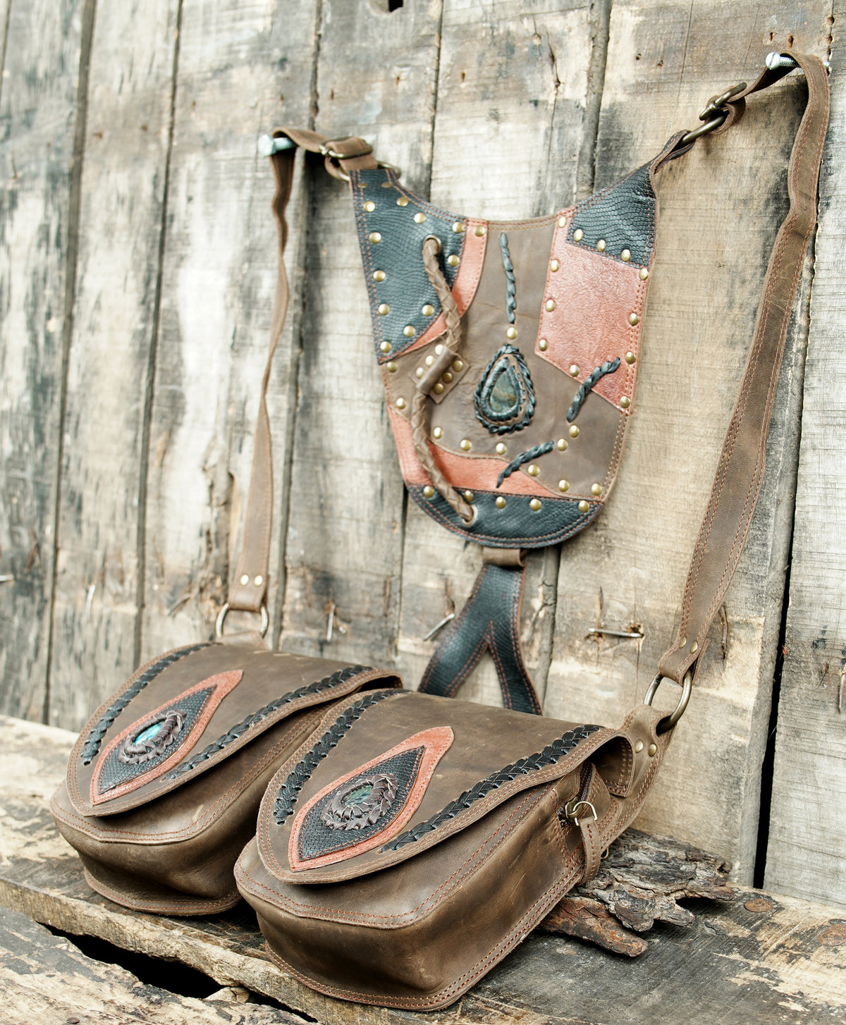Unisex leather utility harness with double hip bags and antique brass studs
 