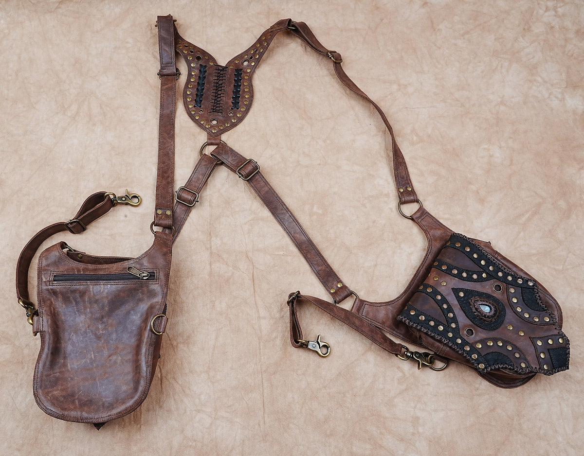 Leather festival belt bag with adjustable straps and detailed metal embellishments