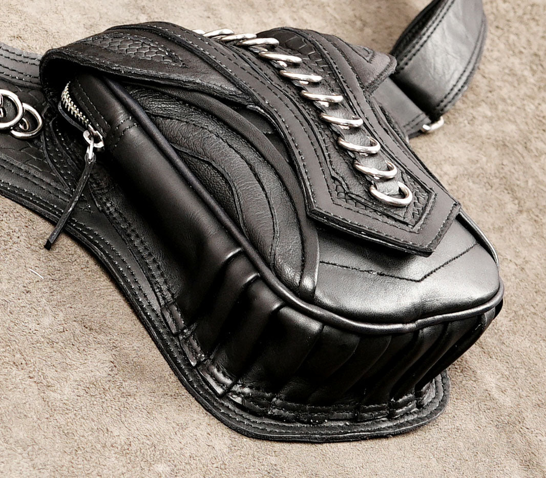 Battle harness style leather pouch with ring hardware