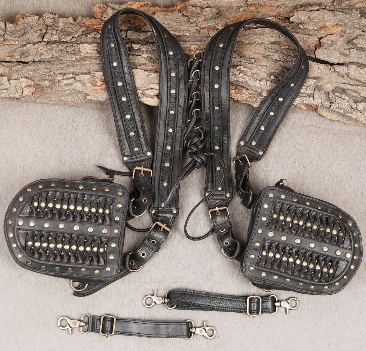 Black leather utility thigh harness with adjustable buckles and decorative details