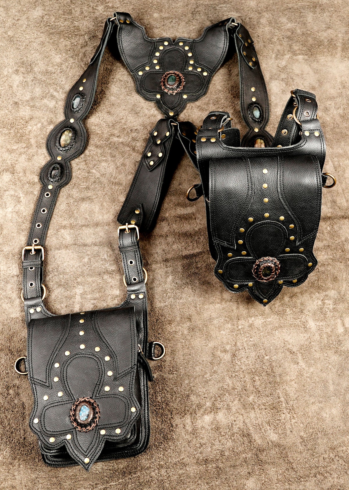 Black leather festival utility bag with multiple adjustable leather straps