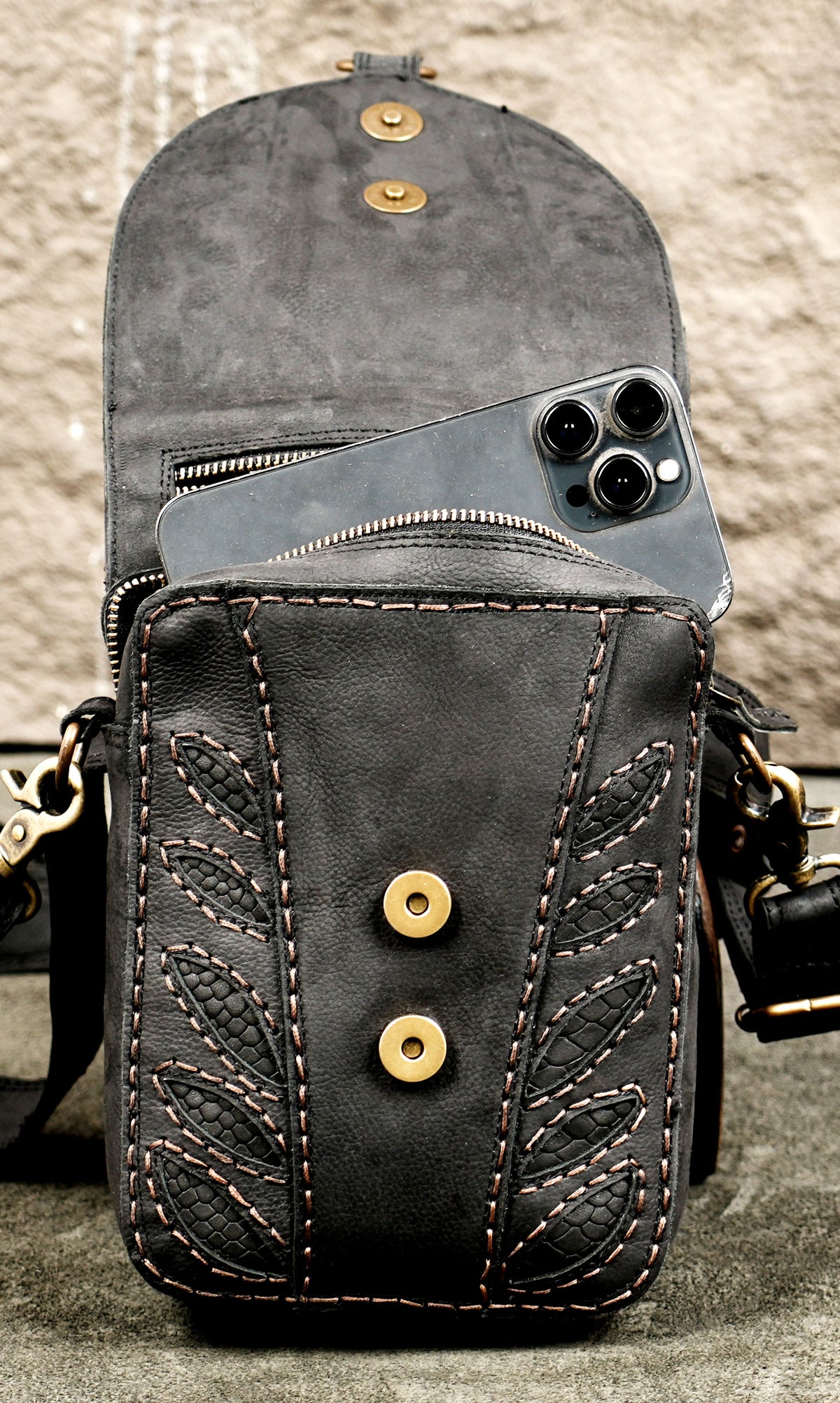 Boho chic black leather sling belt bag with stone accent and studsBoho chic black leather sling belt bag with stone accent and studs